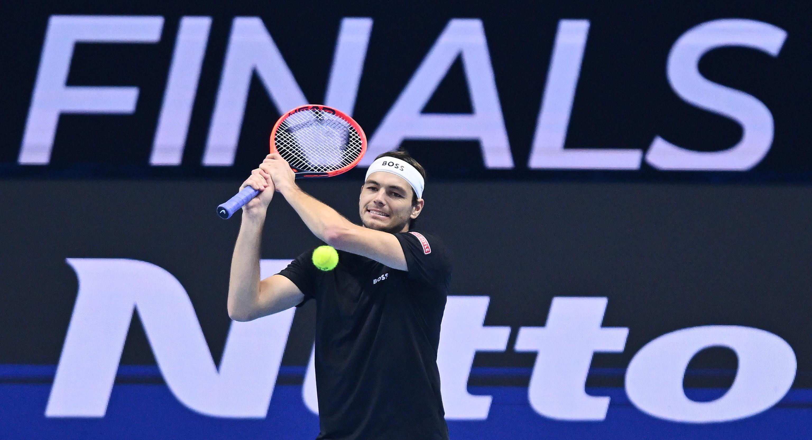 epa11720771 Taylor Fritz of USA, in action during his ATP Finals Singles match against Alex de Minaur of Australia, in Turin, Italy, 14 November 2024.  EPA-EFE/Alessandro Di Marco