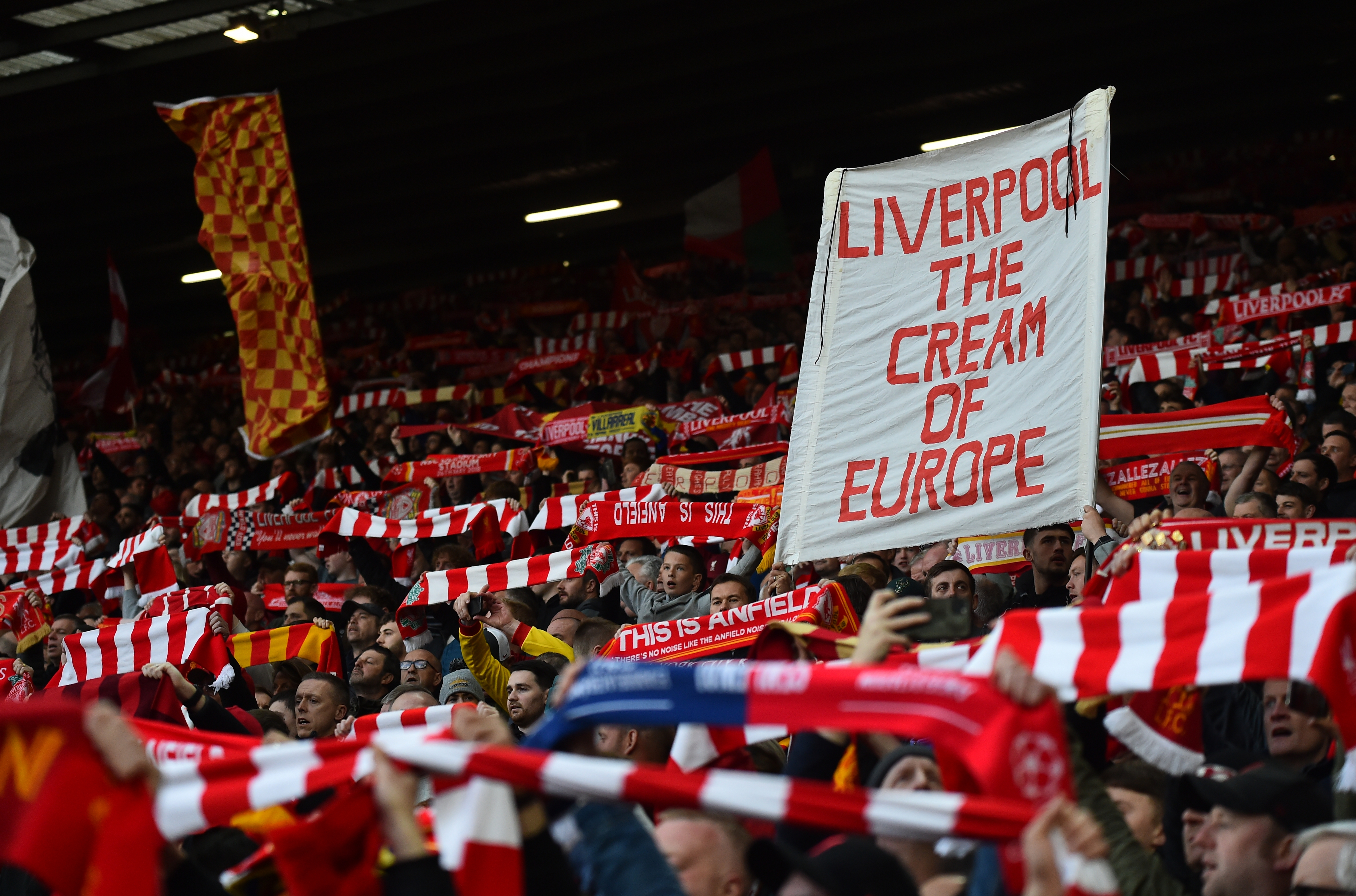 epa09912840 Liverpool fans set up a sign reading 'Liverpool the cream of Europe' ahead of the UEFA Champions League semi final, first leg soccer match between Liverpool FC and Villarreal CF in Liverpool, Britain, 27 April 2022.  EPA-EFE/PETER POWELL