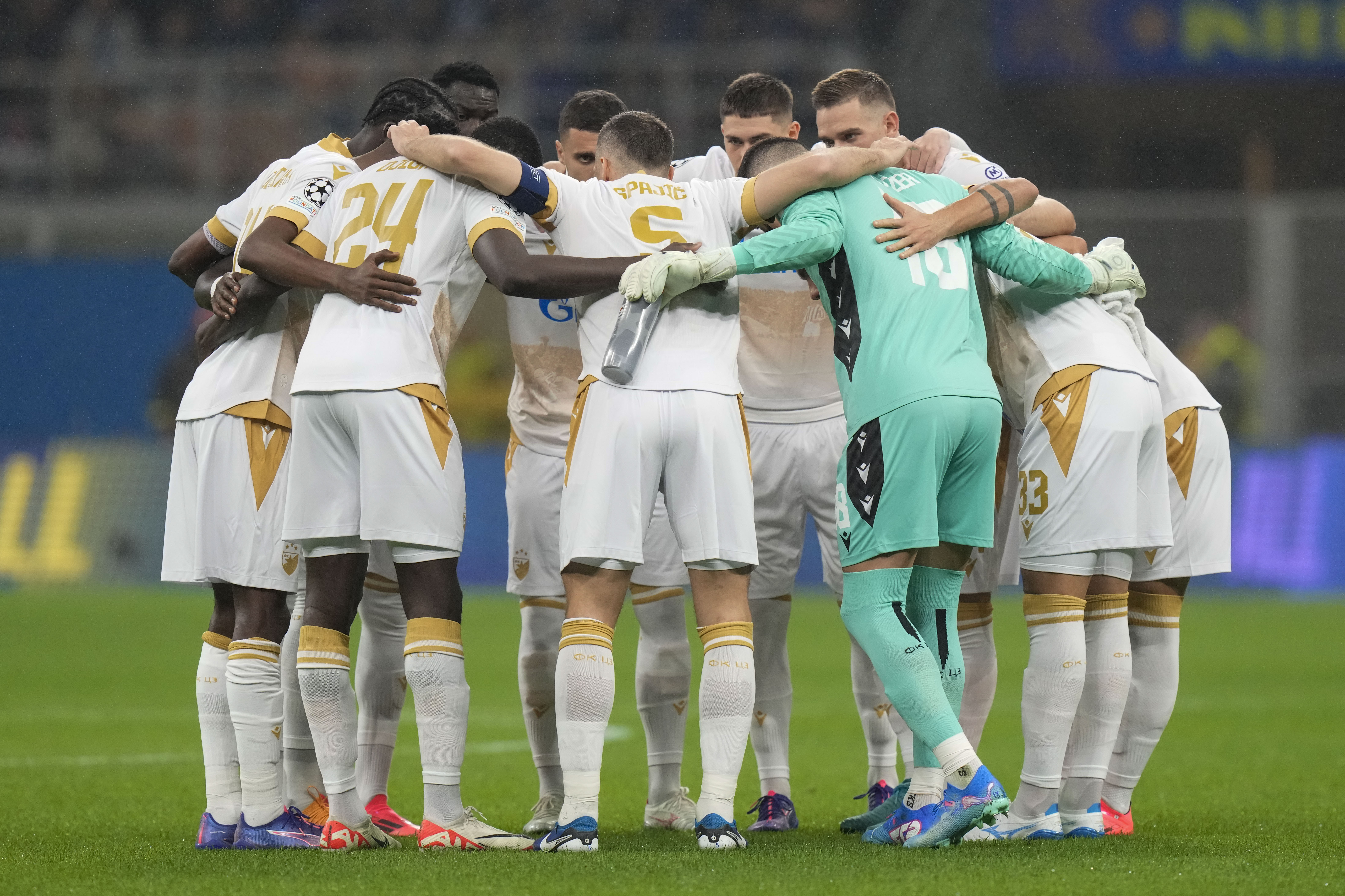 Red Star players prepare prior the Champions League opening phase soccer match between Inter Milan and Red Star, at the San Siro stadium in Milan, Italy, Tuesday, Oct. 1, 2024. (AP Photo/Luca Bruno)