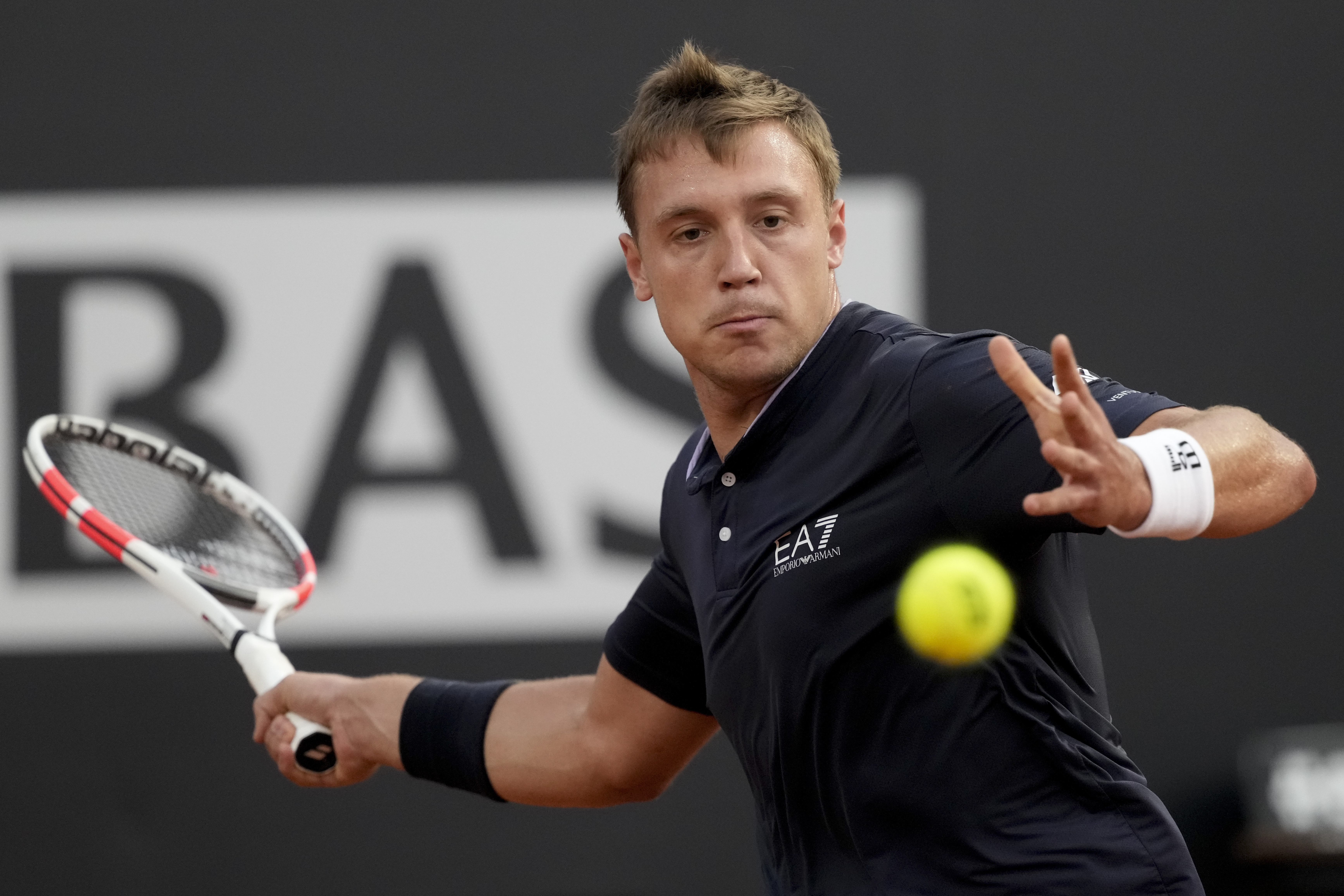 Serbia's Hamad Medjedovic returns the ball to Russia's Daniil Medvedev at the Italian Open tennis tournament, in Rome, Monday, May 13, 2024. (AP Photo/{photograper)