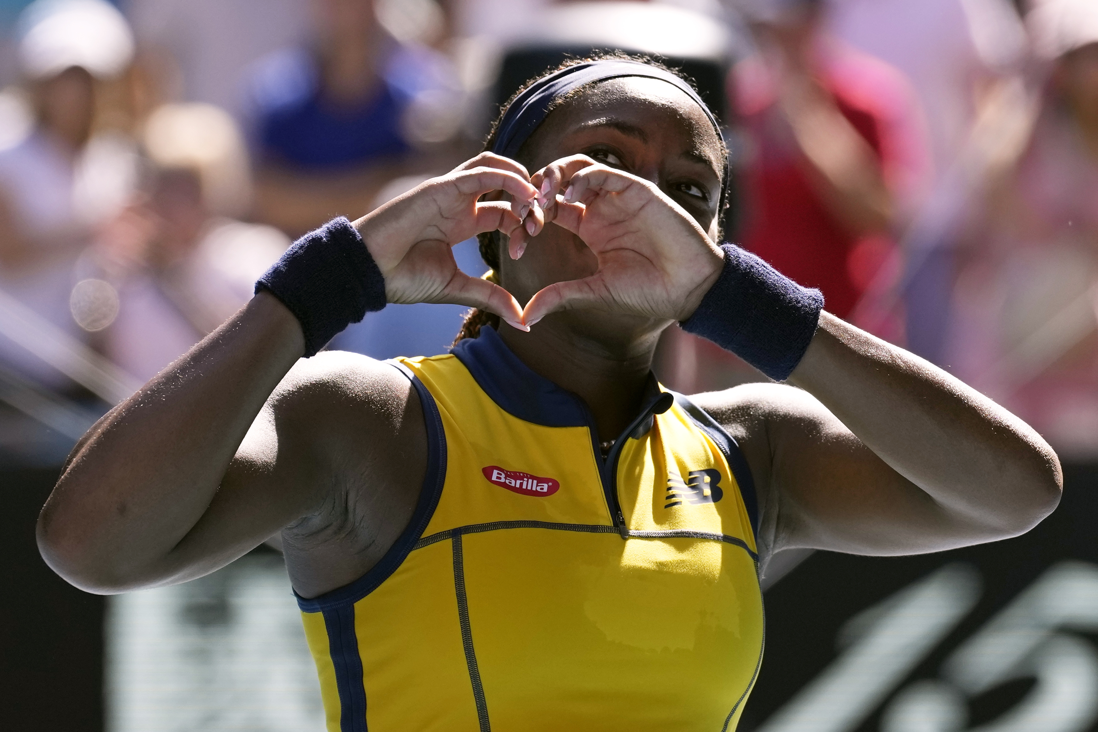 Coco Gauff of the U.S. celebrates after defeating Marta Kostyuk of Ukraine in their quarterfinal match at the Australian Open tennis championships at Melbourne Park, Melbourne, Australia, Tuesday, Jan. 23, 2024. (AP Photo/Alessandra Tarantino)