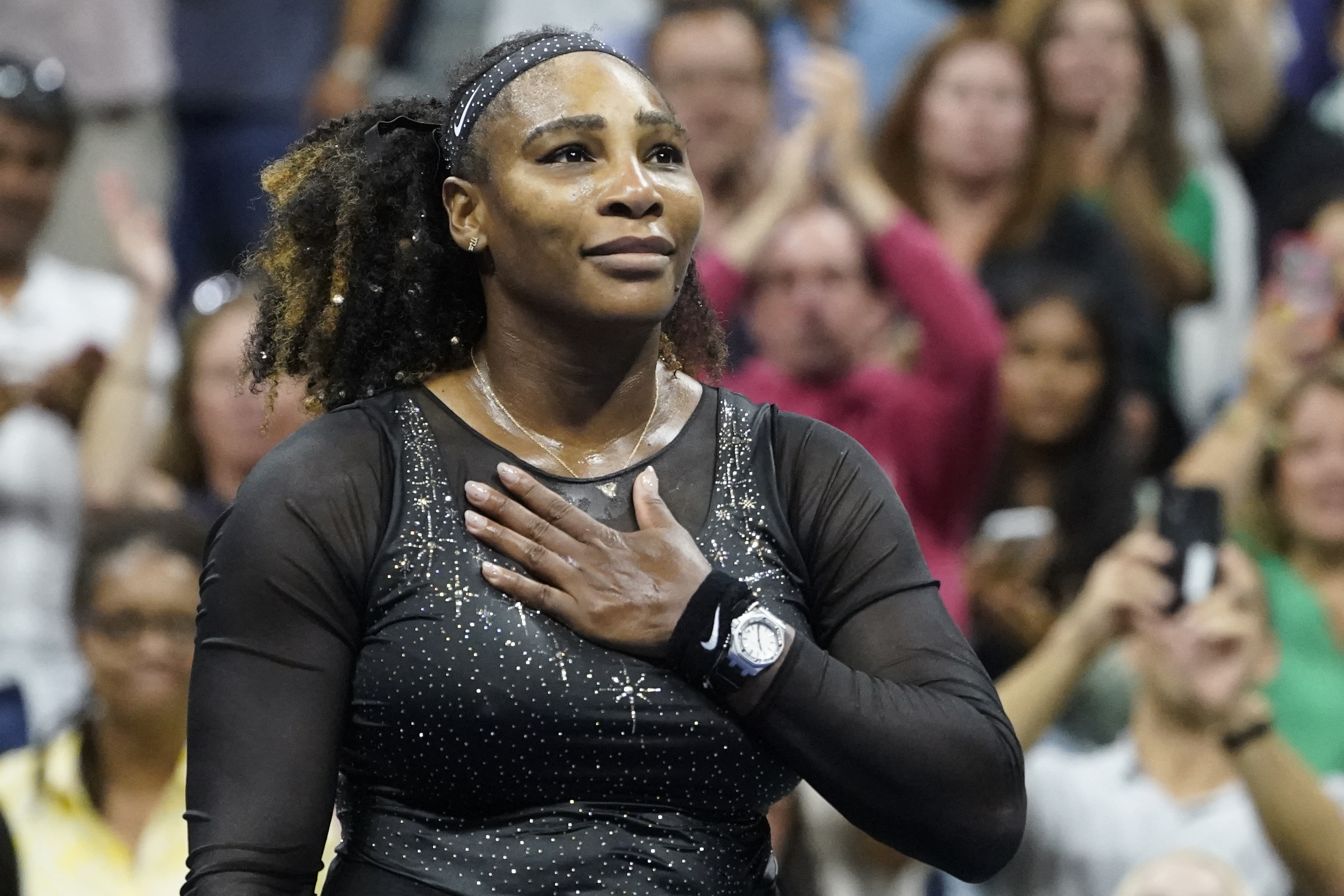 Serena Williams, of the United States, acknowledges the crowd after losing to Ajla Tomljanovic, of Austrailia, during the third round of the U.S. Open tennis championships, Friday, Sept. 2, 2022, in New York. (AP Photo/John Minchillo)