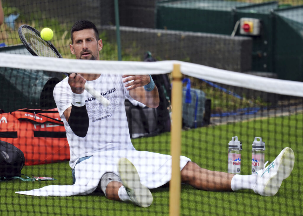 Serbia's Novak Djokovic during a training session at the All England Lawn Tennis and Croquet Club in Wimbledon ahead of the Wimbledon tennis tournament, Monday June 24, 2024. (John Walton/PA via AP)