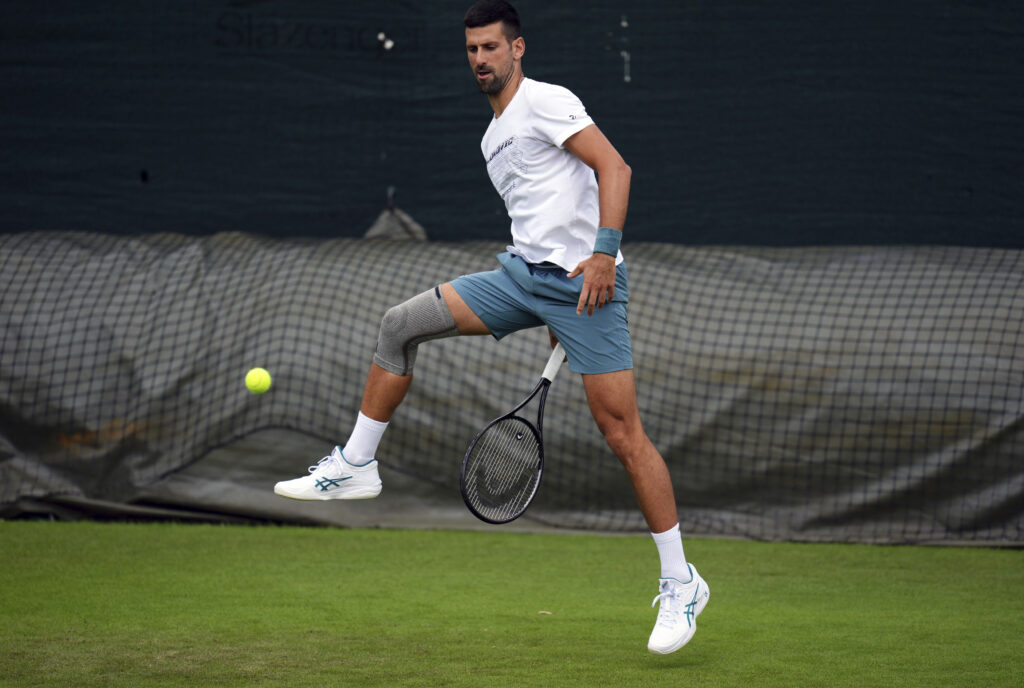 Serbia's Novak Djokovic practices during a training session at the All England Lawn Tennis and Croquet Club in Wimbledon ahead of the Wimbledon Championships, which begins on July 1st, in London, Monday June 24, 2024. (John Walton/PA via AP)