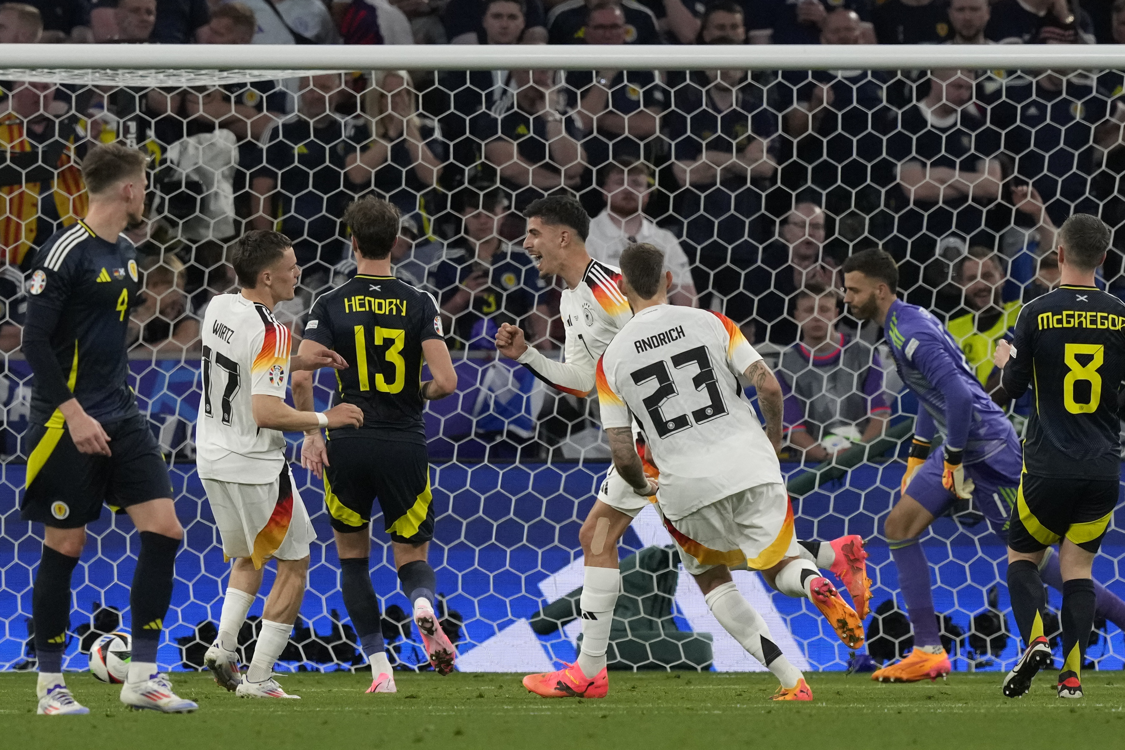 Germany's Kai Havertz celebrates after he scored his side's third goal from the penalty spot during a Group A match between Germany and Scotland at the Euro 2024 soccer tournament in Munich, Germany, Friday, June 14, 2024. (AP Photo/Frank Augstein)