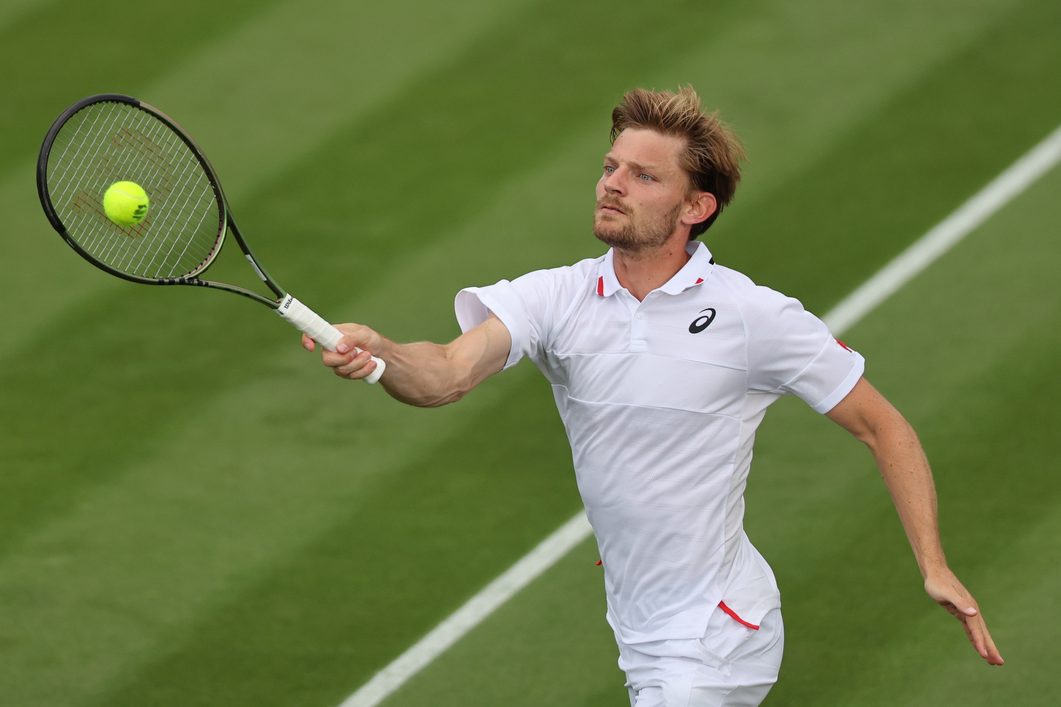 epa10724318 David Goffin of Belgium plays Fabian Maroszan of Hungary in their 1st round match at the Wimbledon Championships, Wimbledon, Britain, 03 July 2023.  EPA-EFE/TOLGA AKMEN   EDITORIAL USE ONLY