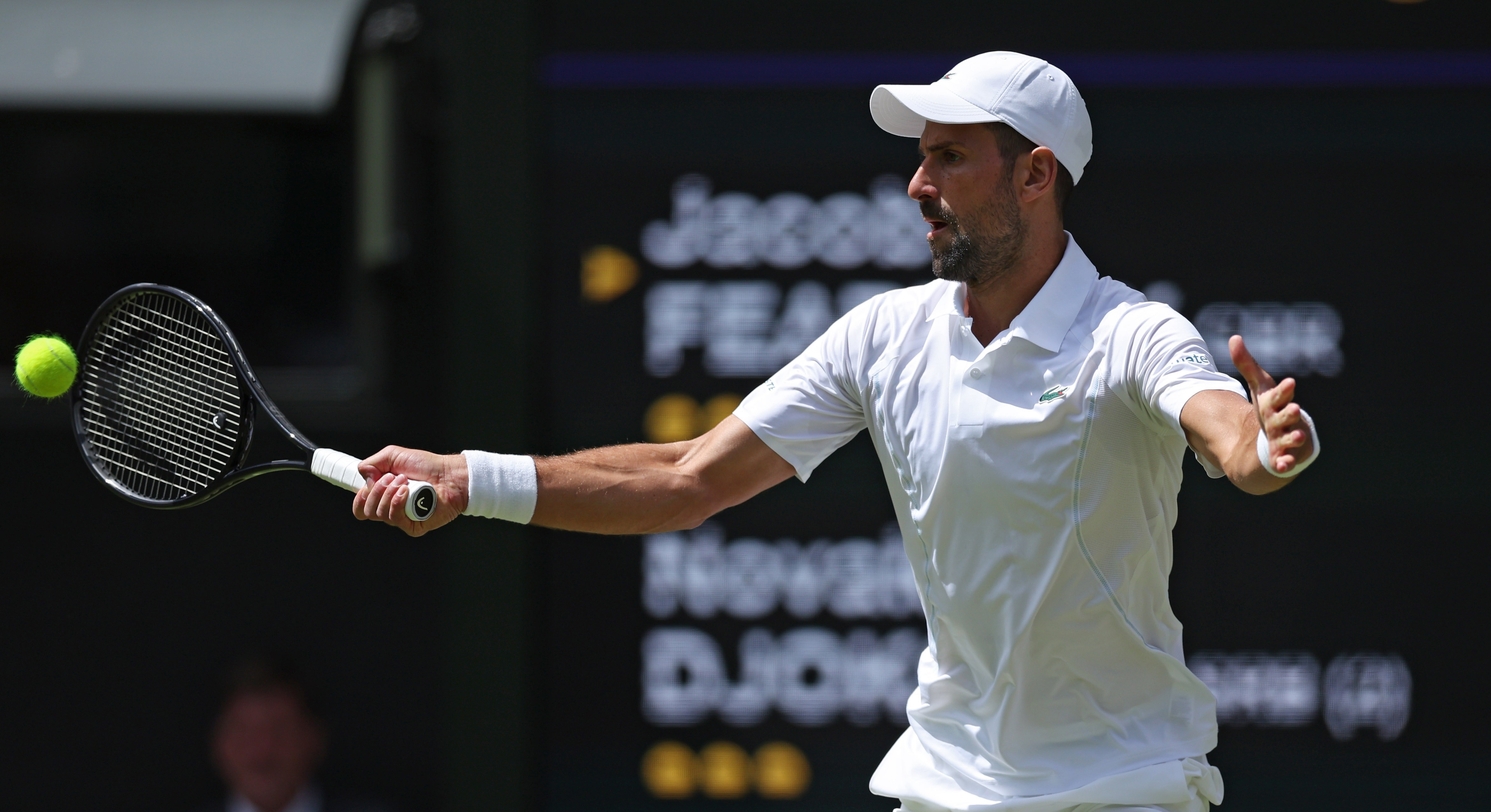 epa11456865 Novak Djokovic of Serbia in action during his Men's 2nd round match against Jacob Fearnley of Britain at the Wimbledon Championships, in Wimbledon, London, Britain, 04 July 2024.  EPA-EFE/ADAM VAUGHAN   EDITORIAL USE ONLY