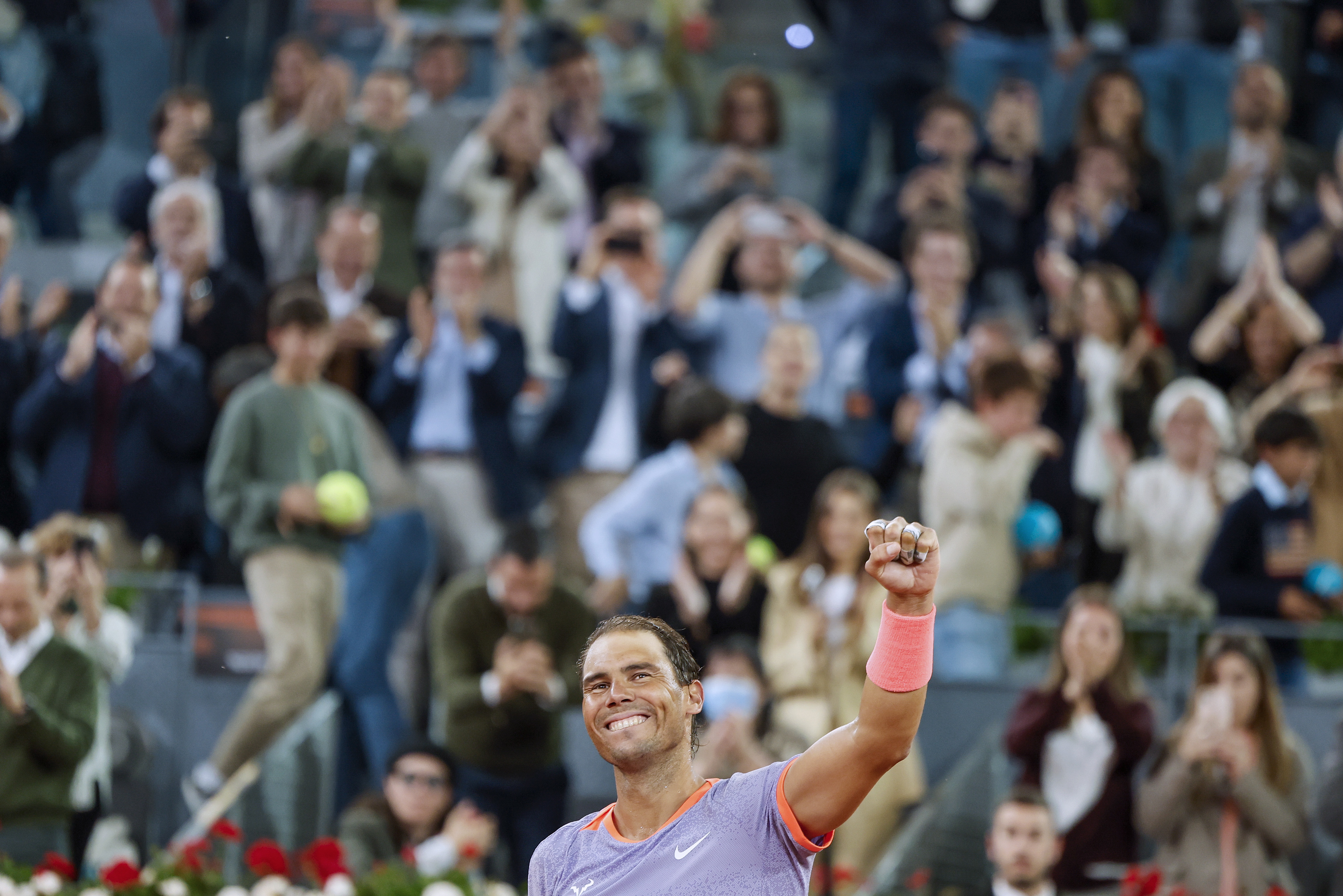 epa11305157 Rafael Nadal of Spain celebrates his win over Alex de Minaur of Australia following their second round tennis match at the Madrid Open tennis tournament, Madrid, Spain, 27 April 2024.  EPA-EFE/SERGIO PEREZ