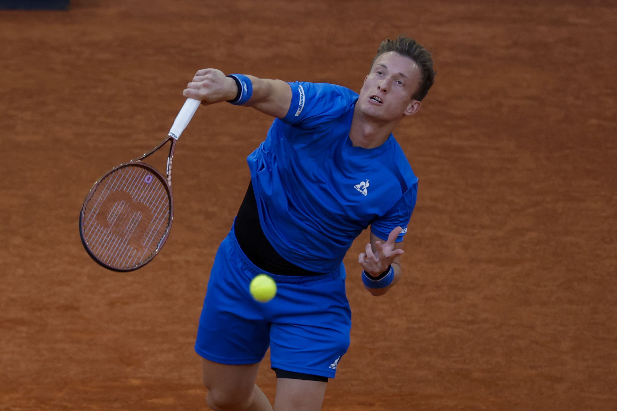 epa11316962 Jiri Lehecka of Czech Republic action against Felix Auger-Aliassime of Canada in during their semi-finals match at the Madrid Open tennis tournament in Madrid, Spain, 03 May 2024.  EPA-EFE/JUANJO MARTIN