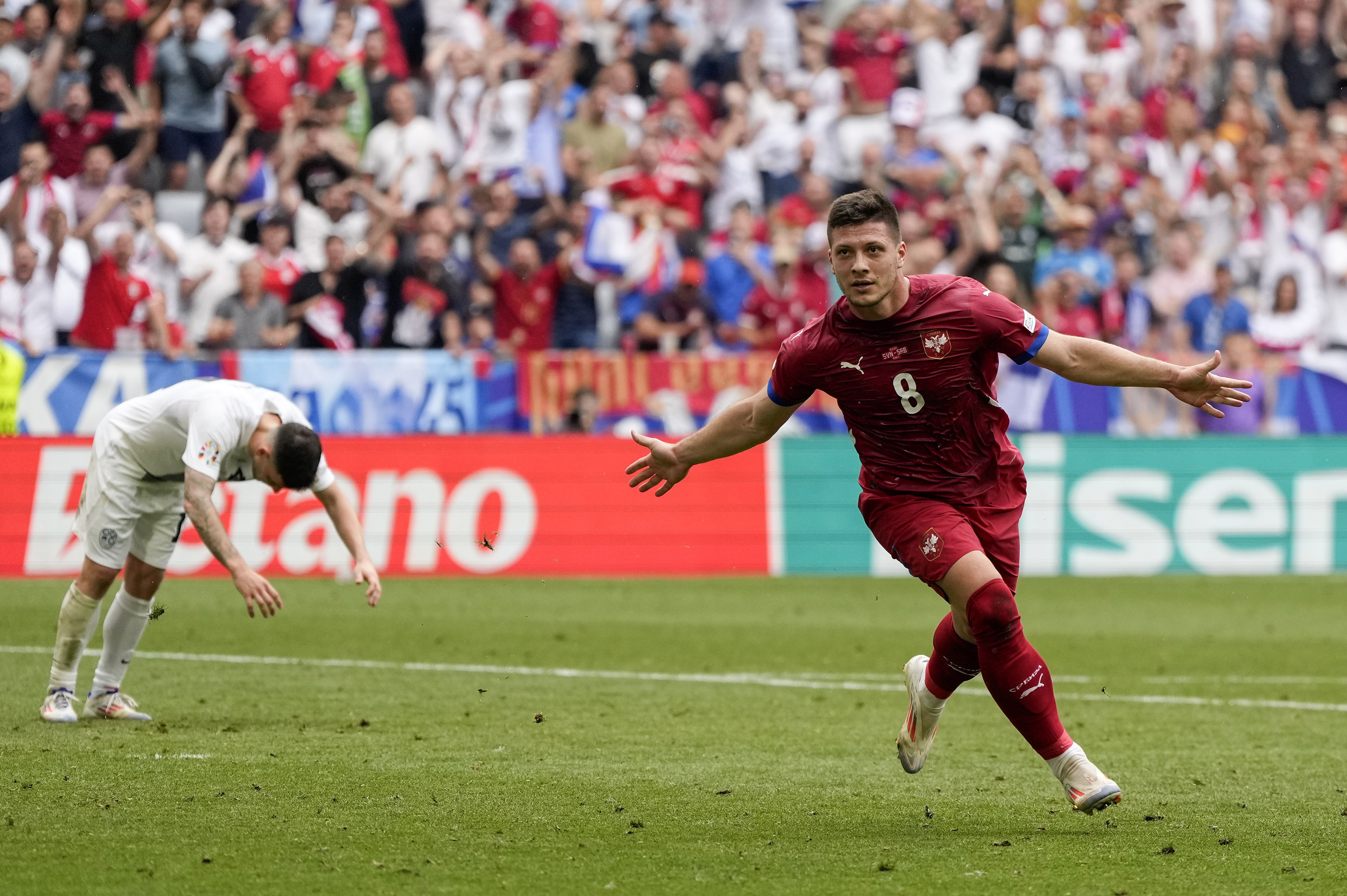 Serbia's Luka Jovic celebrates after scoring his side first goal during a Group C match between Slovenia and Serbia at the Euro 2024 soccer tournament in Munich, Germany, Thursday, June 20, 2024. (AP Photo/Matthias Schrader)