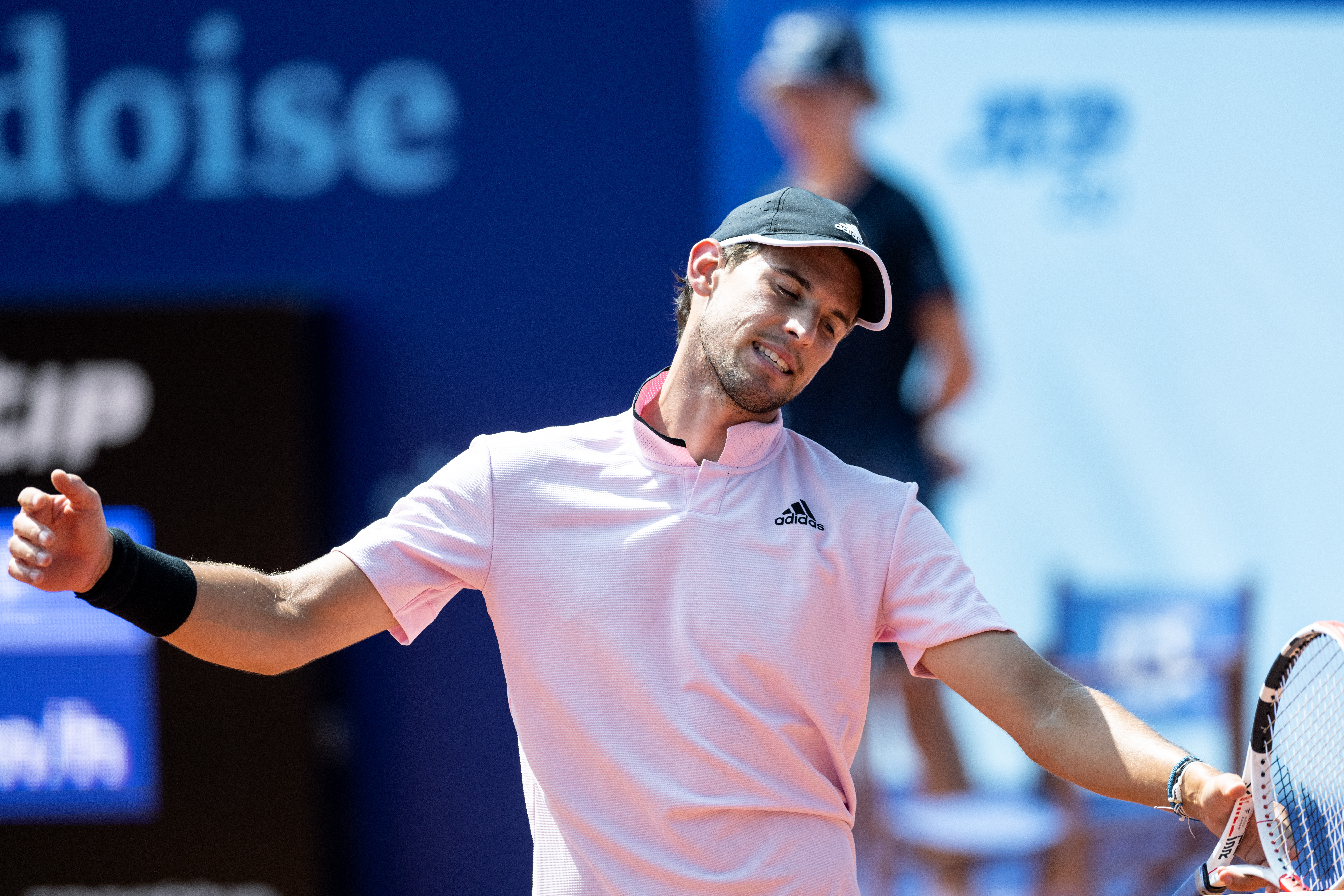 epa10079859 Dominic Thiem of Austria reacts during the singles match against Hugo Gaston of France at the Swiss Open tennis tournament in Gstaad, Switzerland, 19 July 2022.  EPA-EFE/PETER SCHNEIDER