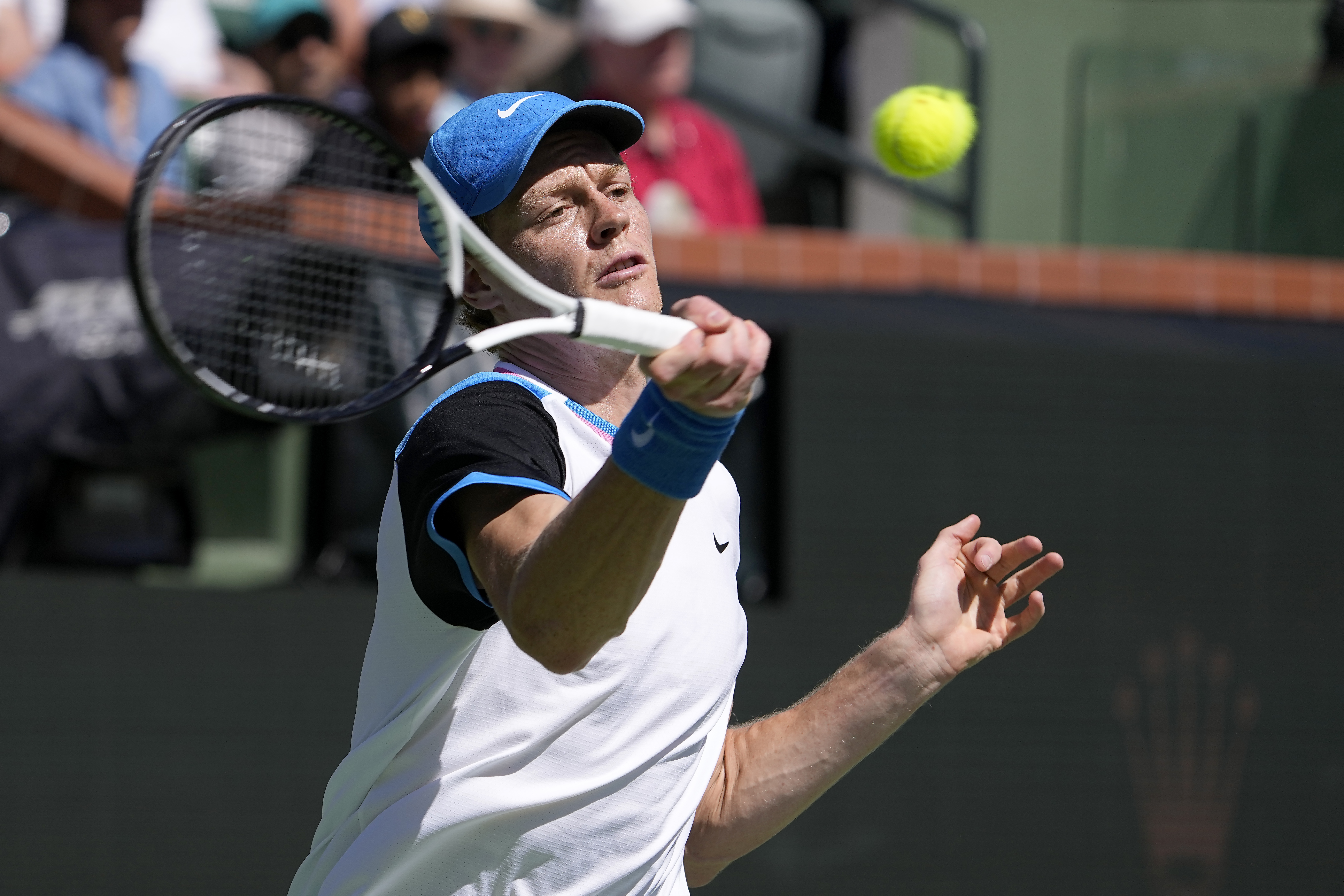 Jannik Sinner, of Italy, returns a shot against Thanasi Kokkinakis, of Australia, at the BNP Paribas Open tennis tournament in Indian Wells, Calif., Friday, March 8, 2024. (AP Photo/Mark J. Terrill)