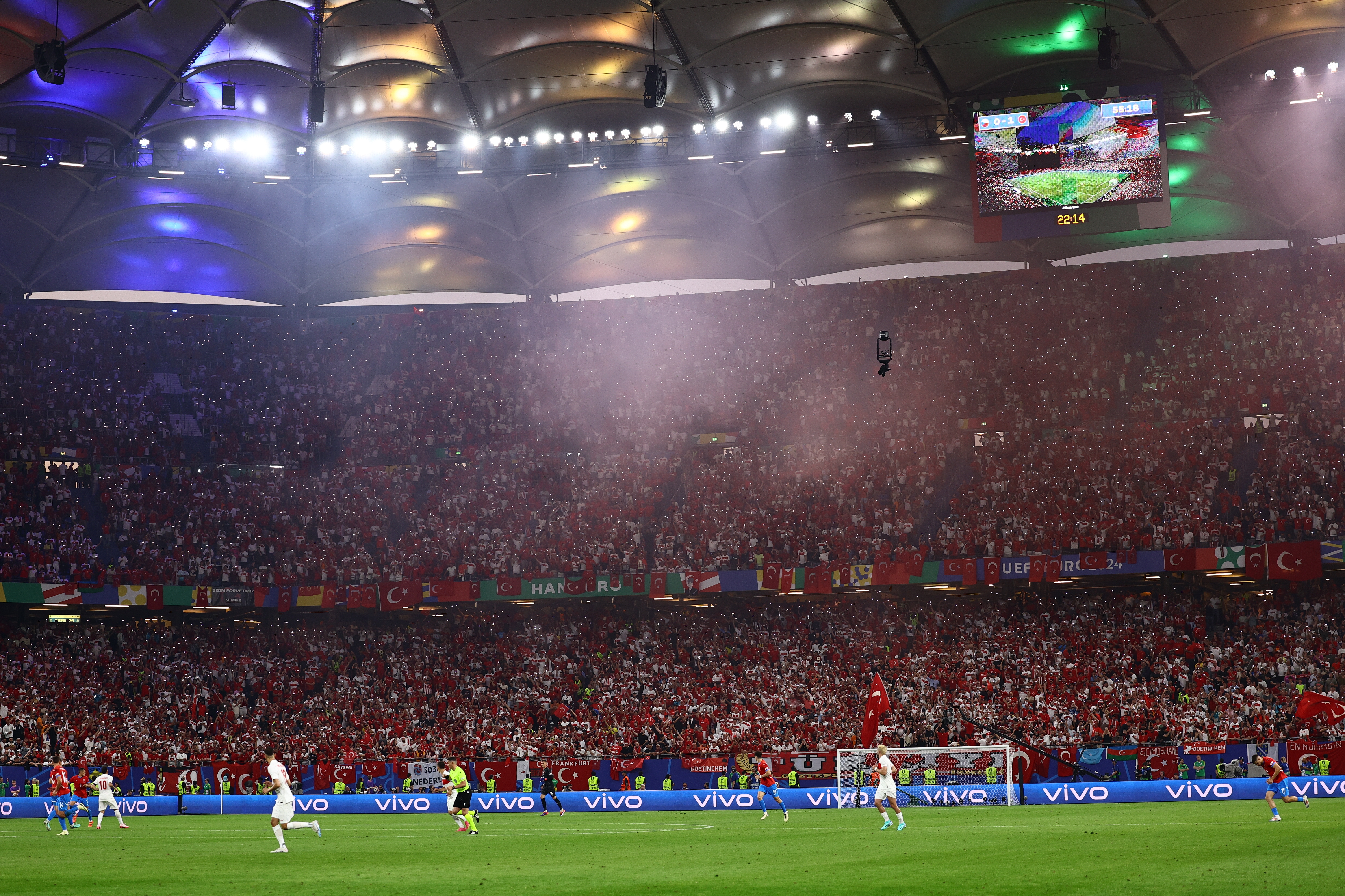 epa11440357 Turkey supporters celebrate during the UEFA EURO 2024 group F soccer match between Czech Republic and Turkey, in Hamburg, Germany, 26 June 2024.  EPA-EFE/FILIP SINGER