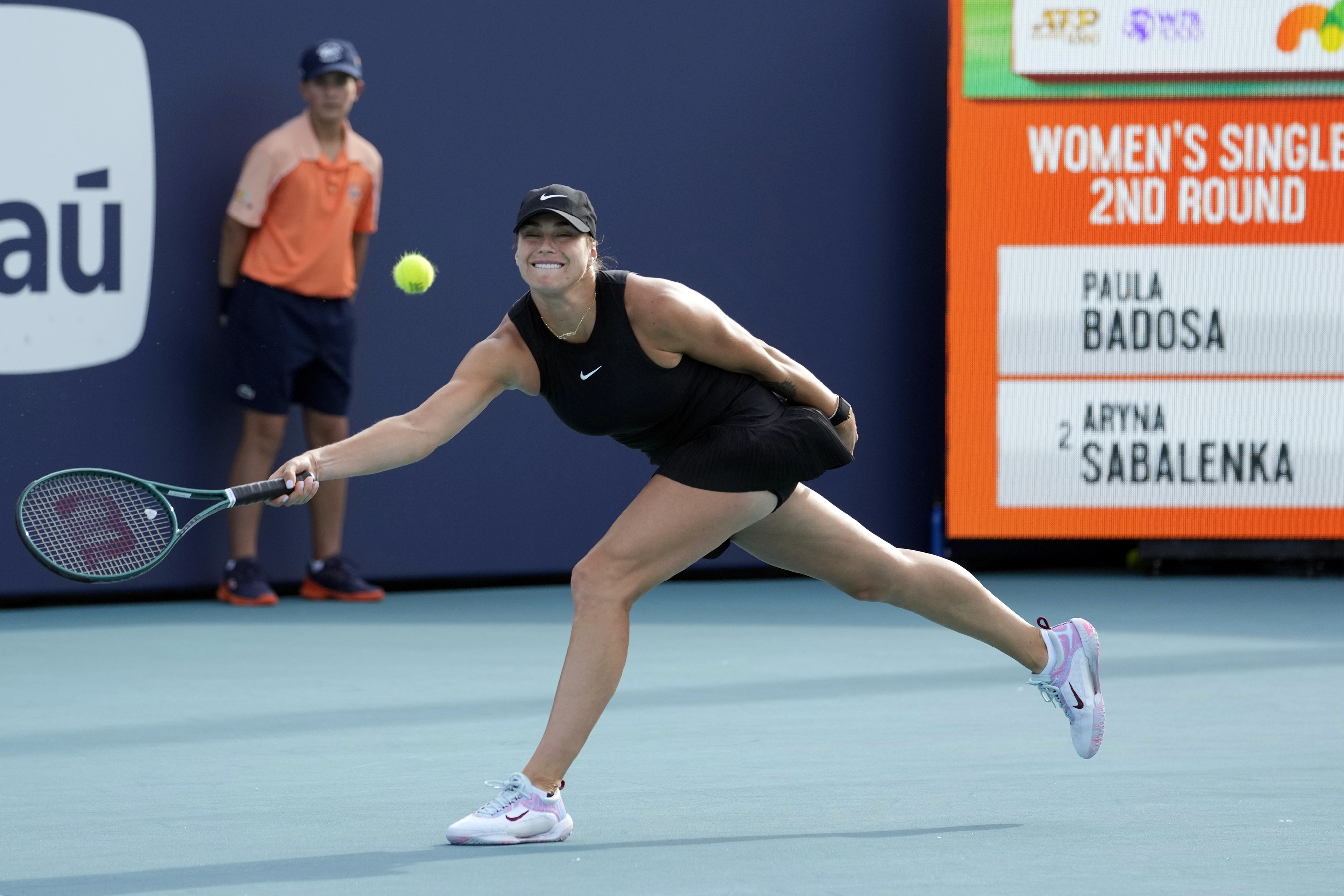 Aryna Sabalenka, of Belarus, hits a return to Paula Badosa, of Spain, at the Miami Open tennis tournament, Friday, March 22, 2024, in Miami Gardens, Fla. (AP Photo/Lynne Sladky)