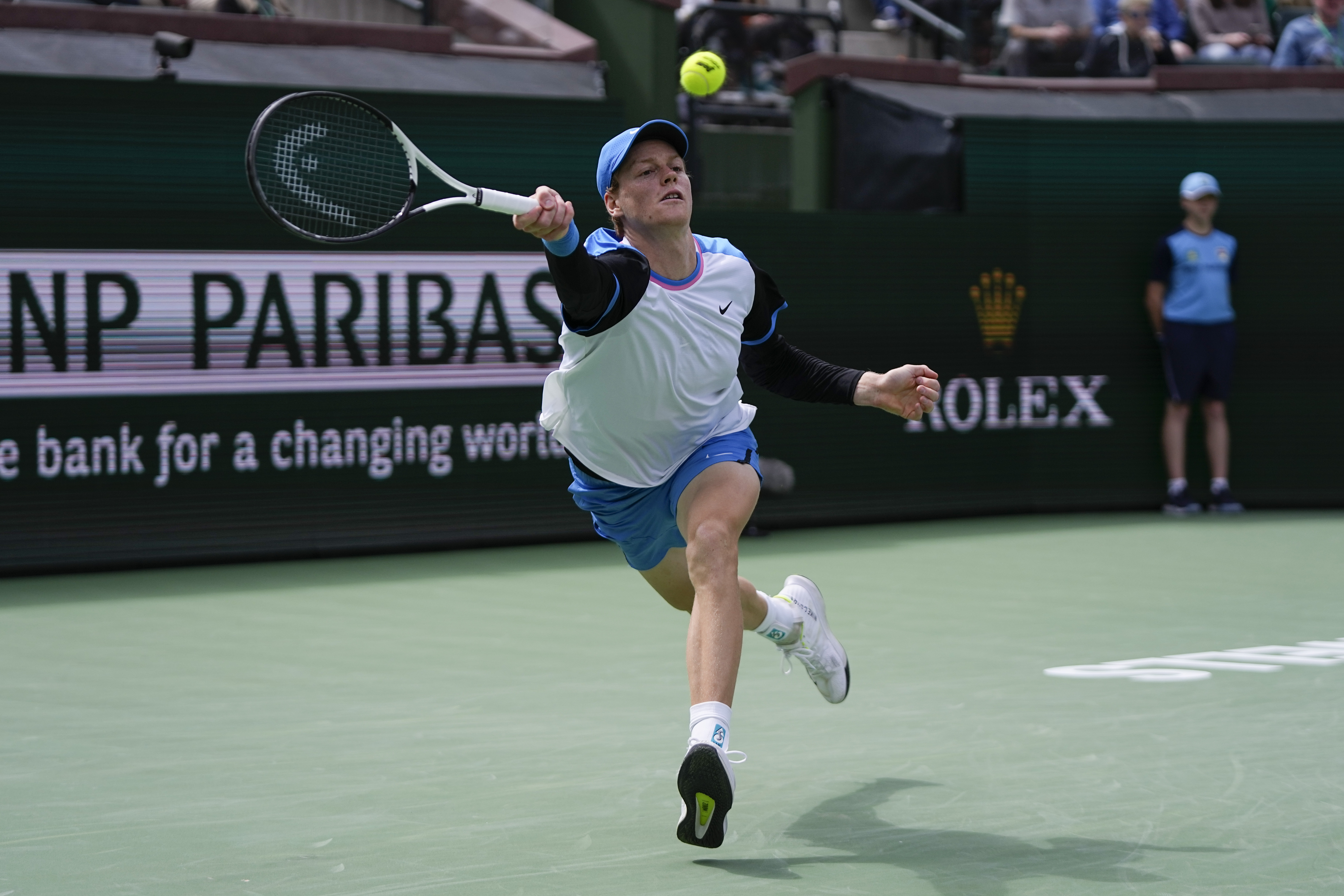 Jannik Sinner, of Italy, returns to Jiri Lehecka, of the Czech Republic, during a quarterfinal match at the BNP Paribas Open tennis tournament, Thursday, March 14, 2024, in Indian Wells, Calif. (AP Photo/Mark J. Terrill)