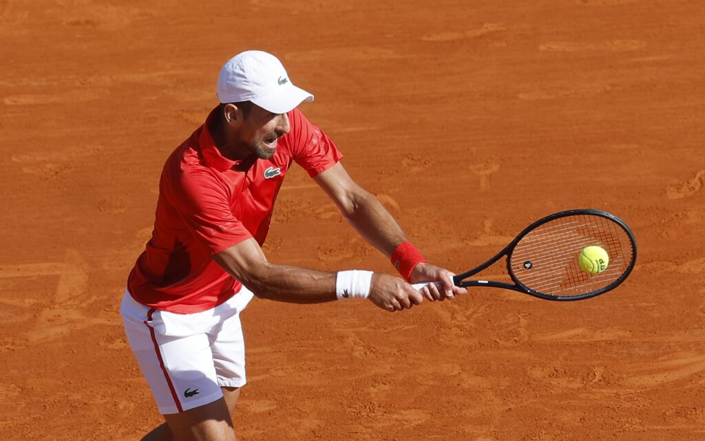 epa11276617 Novak Djokovic of Serbia in action during his semi final match against Casper Ruud of Norway at the ATP Monte Carlo Masters tennis tournament in Roquebrune Cap Martin, France, 13 April 2024.  EPA-EFE/SEBASTIEN NOGIER