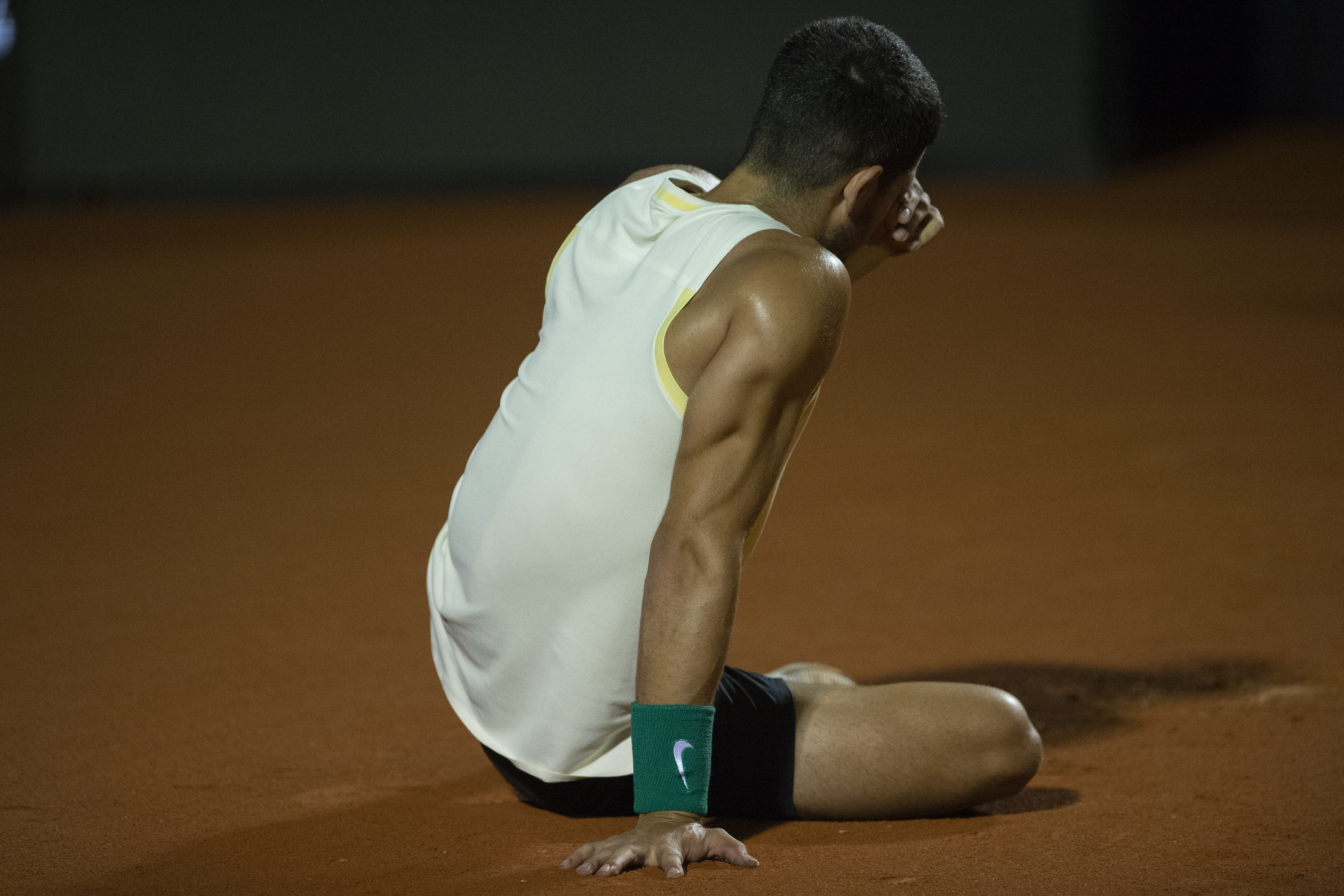 Carlos Alcaraz of Spain reacts after injuring his ankle during the Rio Open Tennis tournament in Rio de Janeiro, Brazil, Tuesday, Feb. 20, 2024. (AP Photo/Armando Paiva)