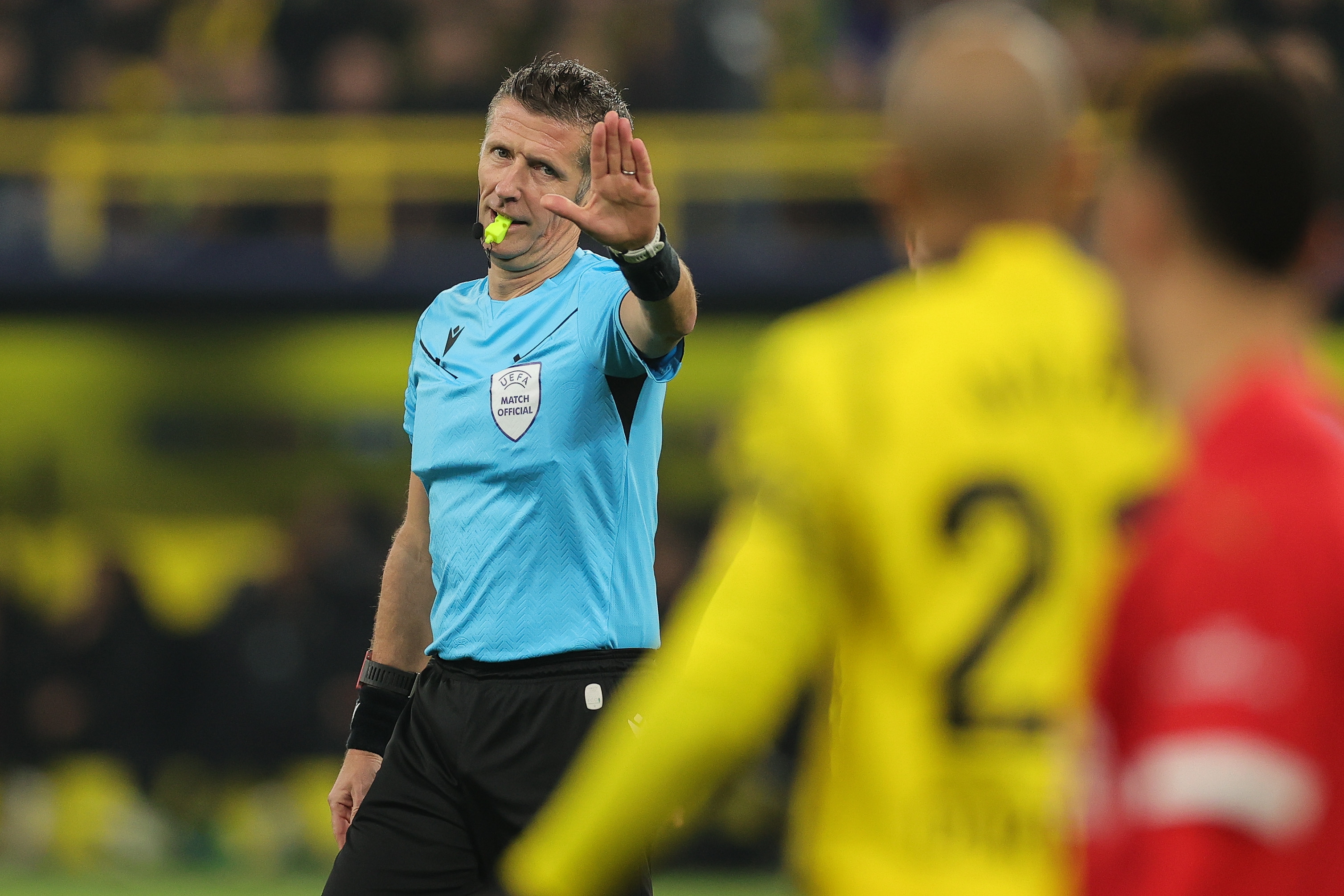 epa11218993 Referee Daniele Orsato reacts during the UEFA Champions League Round of 16, 2nd leg soccer match between Borussia Dortmund and PSV Eindhoven, in Dortmund, Germany, 13 March 2024.  EPA-EFE/FRIEDEMANN VOGEL
