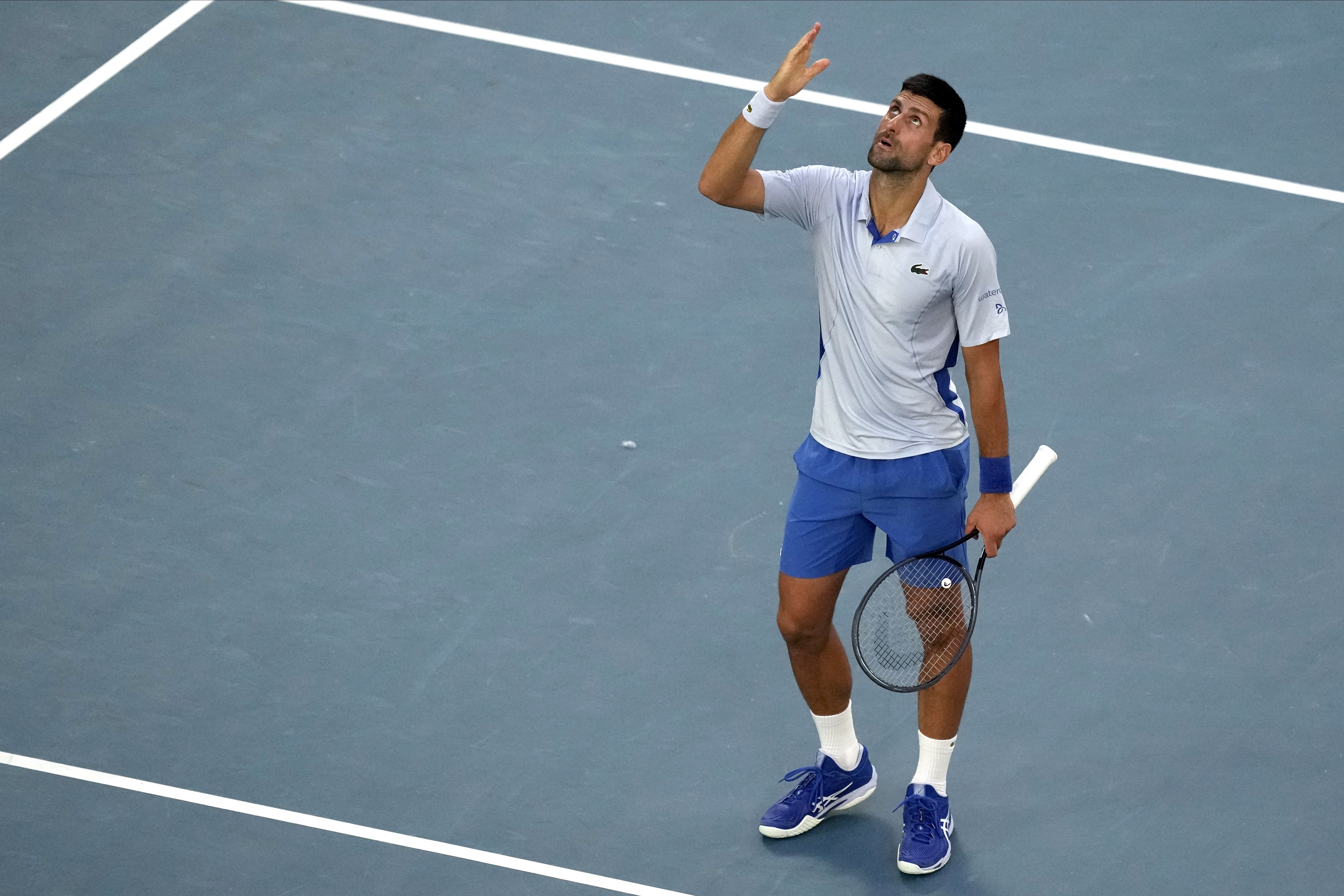 Novak Djokovic of Serbia celebrates after defeating Taylor Fritz of the U.S. in their quarterfinal match at the Australian Open tennis championships at Melbourne Park, Melbourne, Australia, Tuesday, Jan. 23, 2024. (AP Photo/Alessandra Tarantino)