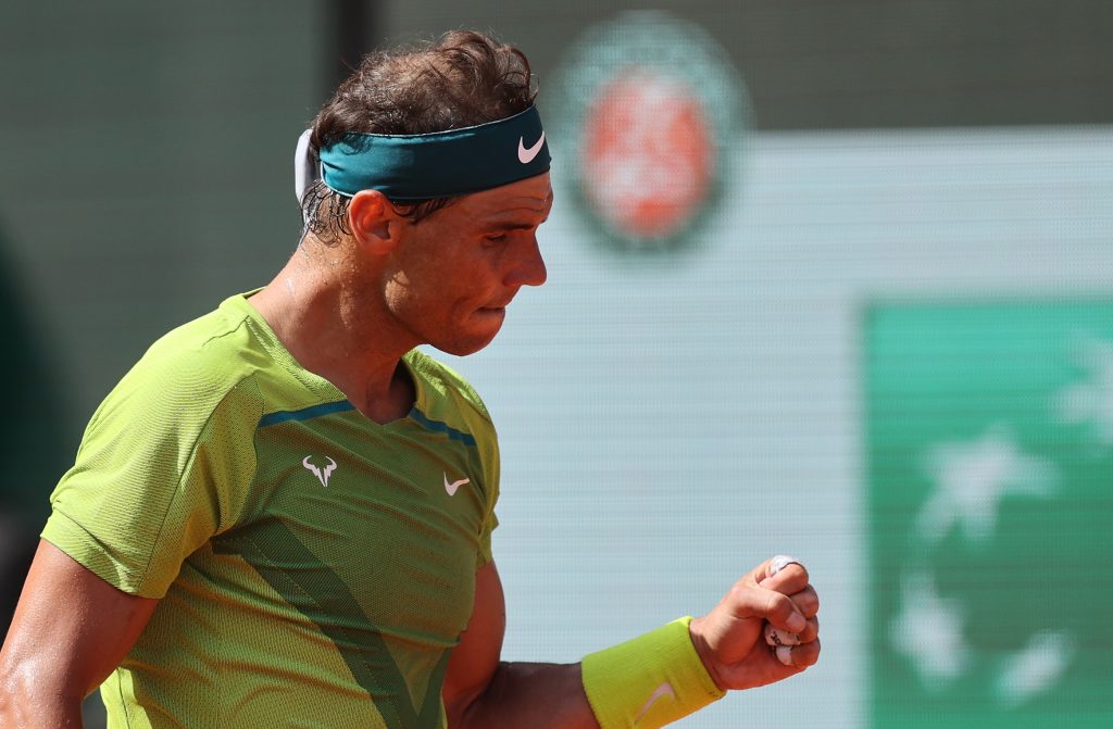 epa09997407 Rafael Nadal of Spain reacts as he plays Casper Ruud of Norway in their Men?s Singles final match during the French Open tennis tournament at Roland ?Garros in Paris, France, 05 June 2022.  EPA-EFE/MARTIN DIVISEK