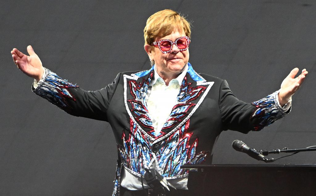 epa09996282 British musician Elton John performs on the stage during his final 'Farewell Yellow Brick Road' tour at the Giuseppe Meazza Stadium in Milan, Italy, 04 June 2022.  EPA-EFE/DANIEL DAL ZENNARO