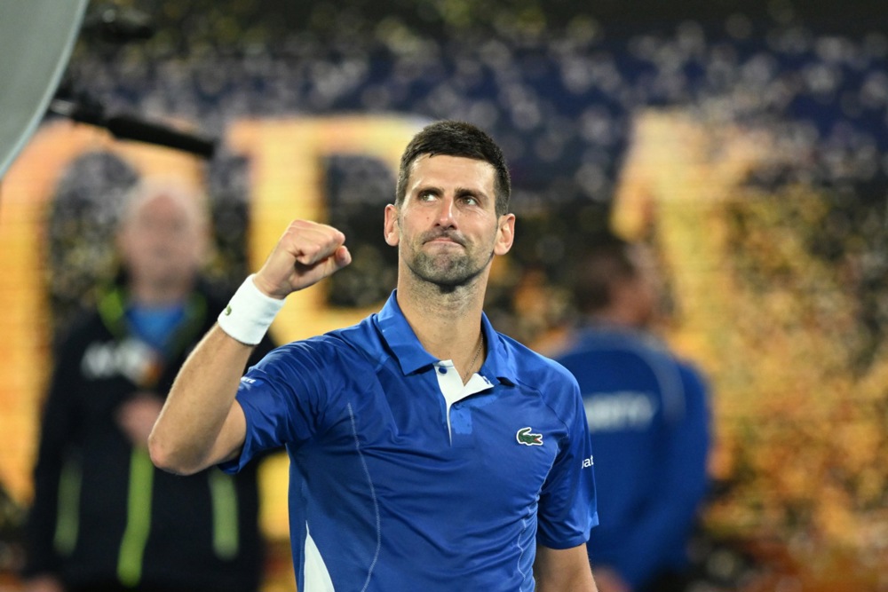 epa11089287 Novak Djokovic of Serbia celebrates his 3rd round win over Tomas Martin Etcheverry of Argentina on Day 6 of the 2024 Australian Open at Melbourne Park in Melbourne, Australia, 19 January 2024.  EPA-EFE/JAMES ROSS AUSTRALIA AND NEW ZEALAND OUT