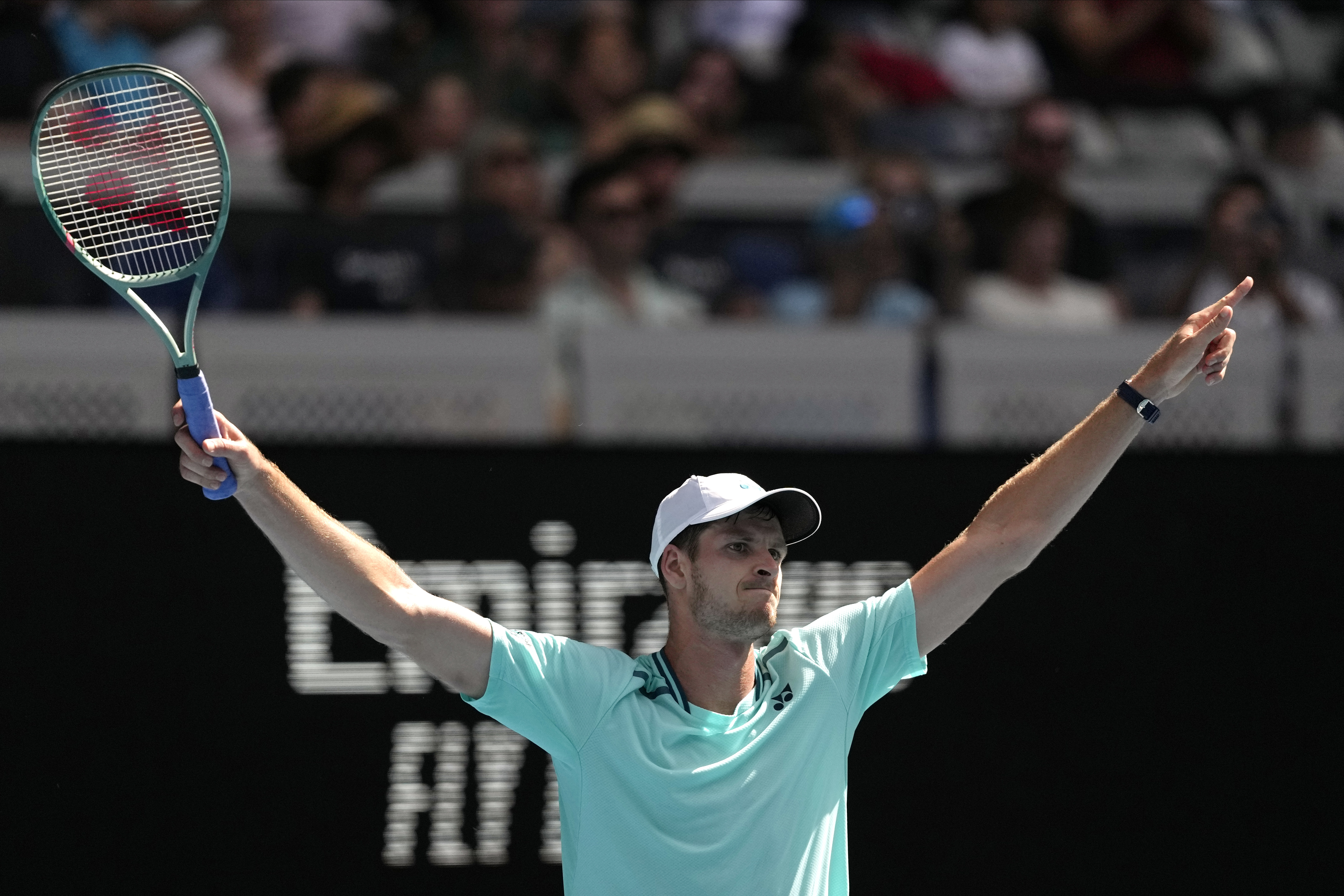 Hubert Hurkacz of Poland celebrates after defeating Ugo Humbert of France in their third round match at the Australian Open tennis championships at Melbourne Park, Melbourne, Australia, Saturday, Jan. 20, 2024. (AP Photo/Louise Delmotte)