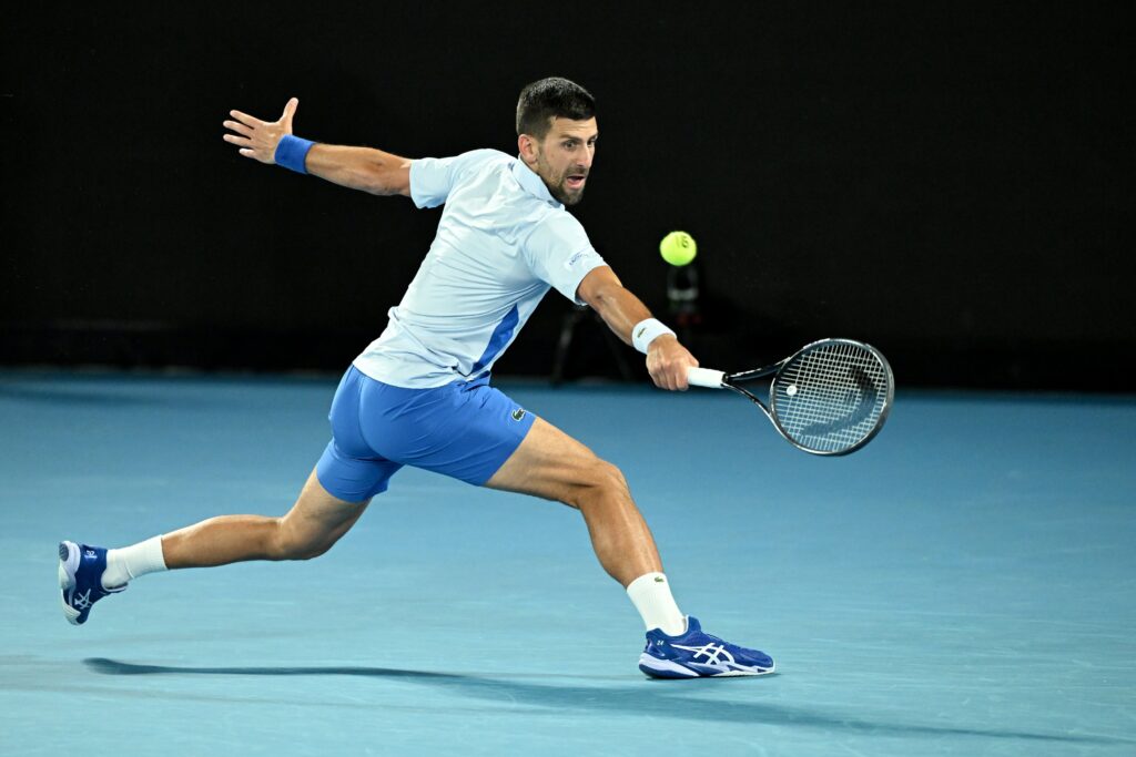 epa11084686 Novak Djokovic of Serbia in action during his round 2 match against Alexei Popyrin of Australia on Day 4 of the 2024 Australian Open at Melbourne Park in Melbourne, Australia, 17 January 2024.  EPA-EFE/JAMES ROSS  AUSTRALIA AND NEW ZEALAND OUT