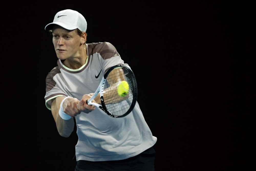 epa11098545 Jannik Sinner of Italy in action during his quarterfinal match against Andrey Rublev of Russia at the Australian Open tennis tournament in Melbourne, Australia, 23 January 2024.  EPA-EFE/MAST IRHAM