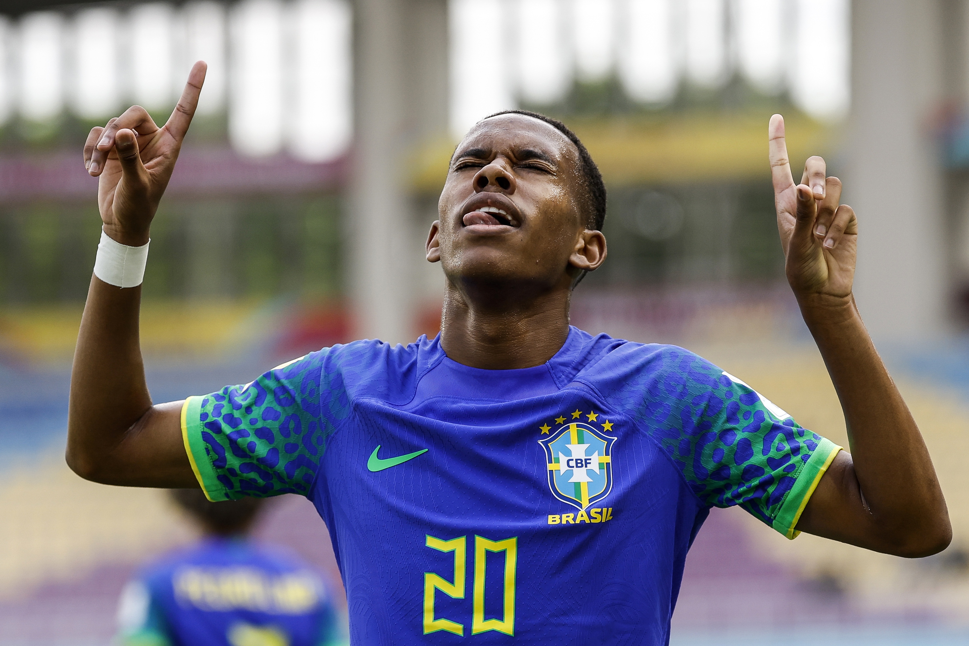 epa10985713 Estevao Willian of Brazil celebrates after scoring the opening goal during the FIFA U-17 World Cup round of sixteen match between Ecuador and Brazil at the Manahan Stadium in Surakarta, Indonesia, 20 November 2023.  EPA-EFE/MAST IRHAM