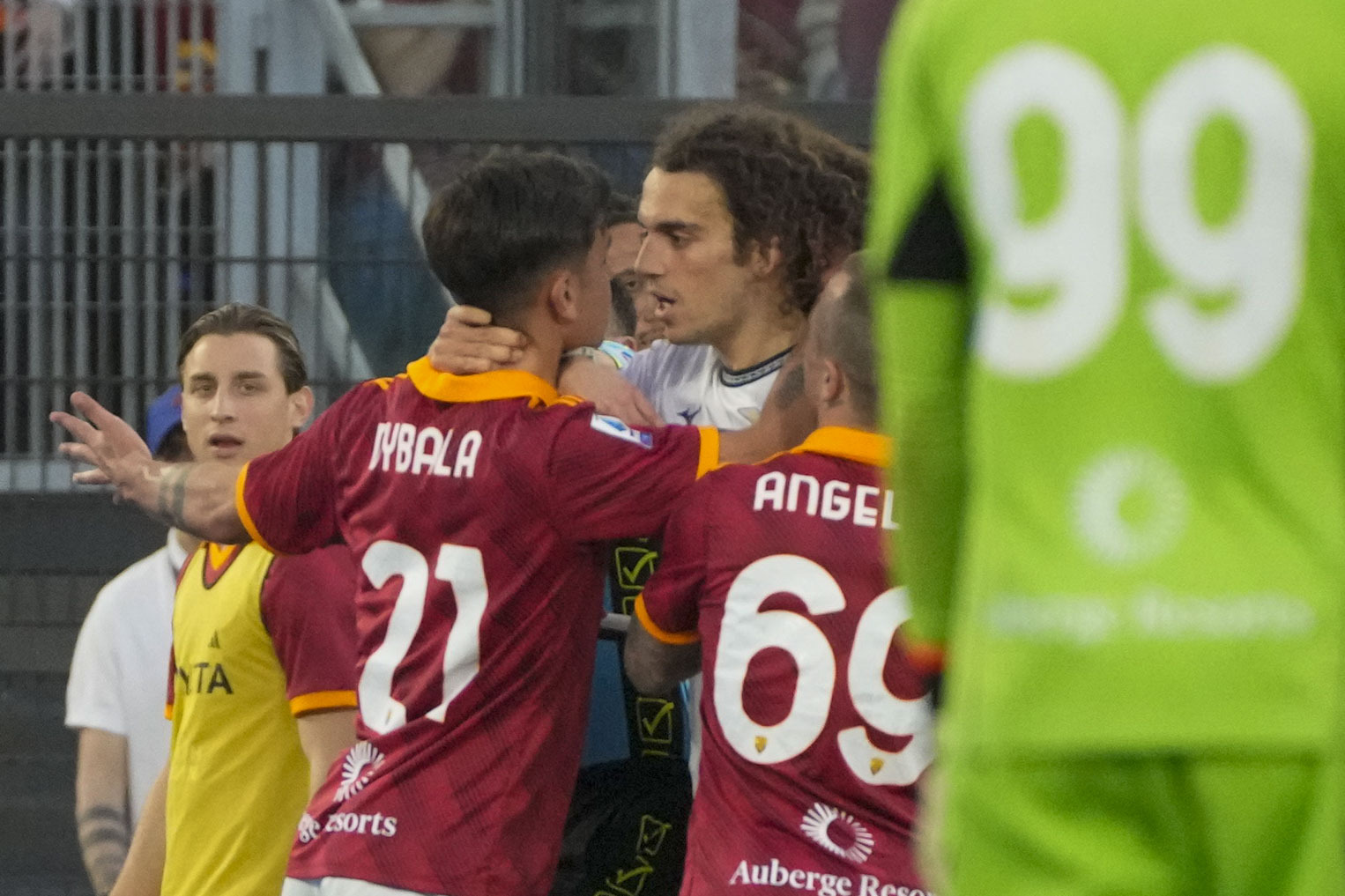Roma's Paulo Dybala, front left, argues with Lazio's Matteo Guendouzi during a Serie A soccer match between Roma and Lazio, at Stadio Olimpico, in Rome, Italy, Saturday, April 6, 2024. (AP Photo/Gregorio Borgia)