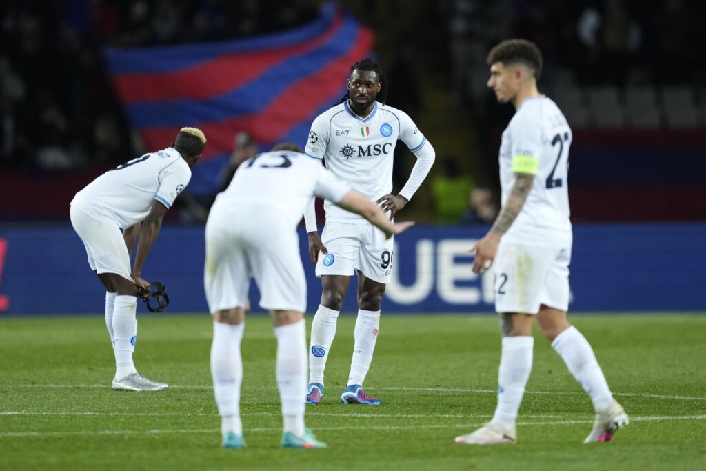 epa11217456 Players of Napoli react during the UEFA Champions League round of 16 second leg soccer match between FC Barcelona and SSC Napoli, in Barcelona, Catalonia, Spain, 12 March 2024.  EPA-EFE/Alejandro Garcia