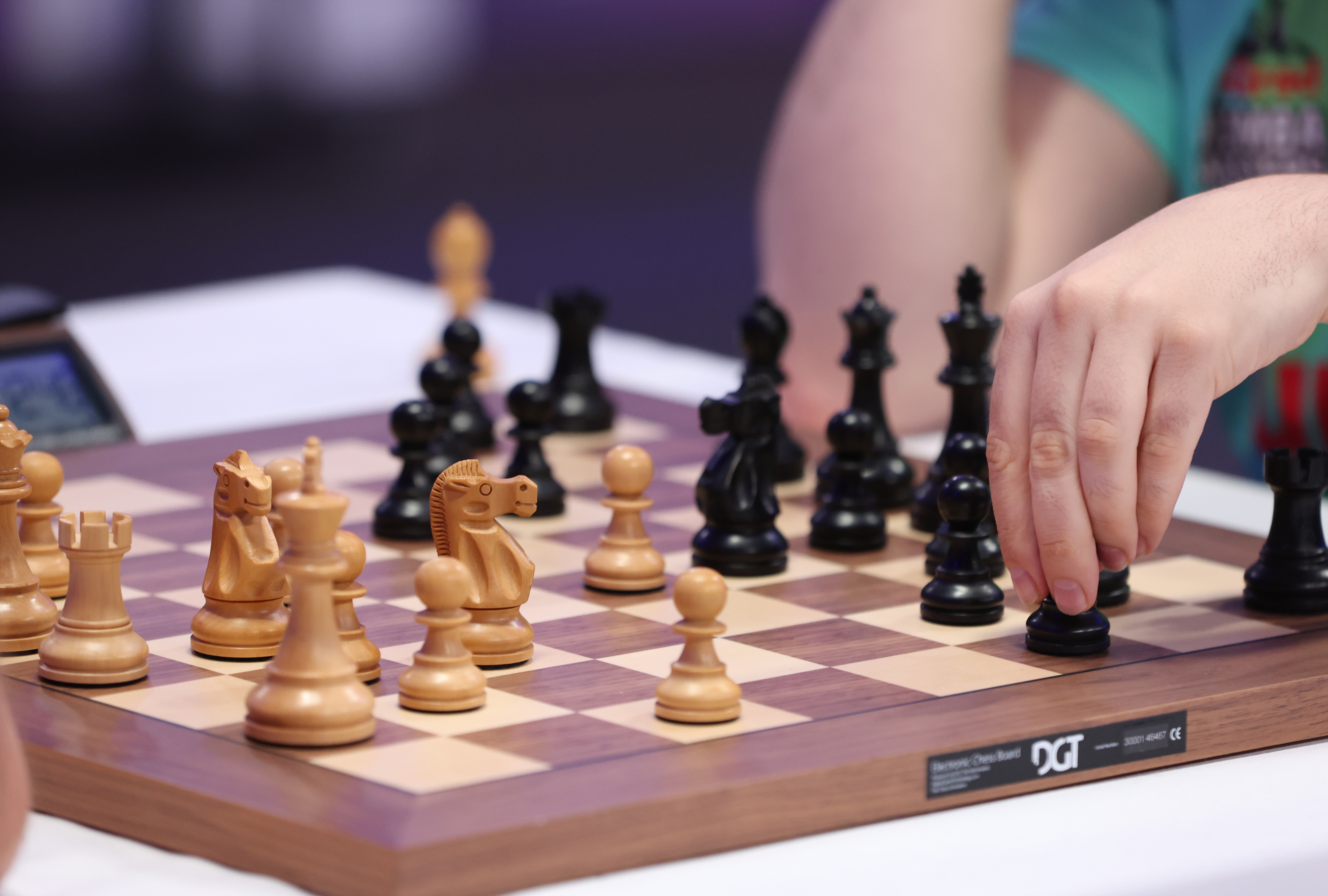 epa10722495 French Maxime Vachier-Lagrave of upGrad Mumba Masters plays against American Levon Aronian (unseen) of Triveni Continental Kings  during the final ofthe Global Chess League in Dubai, United Arab Emirates, 02 July 2023.  EPA-EFE/ALI HAIDER