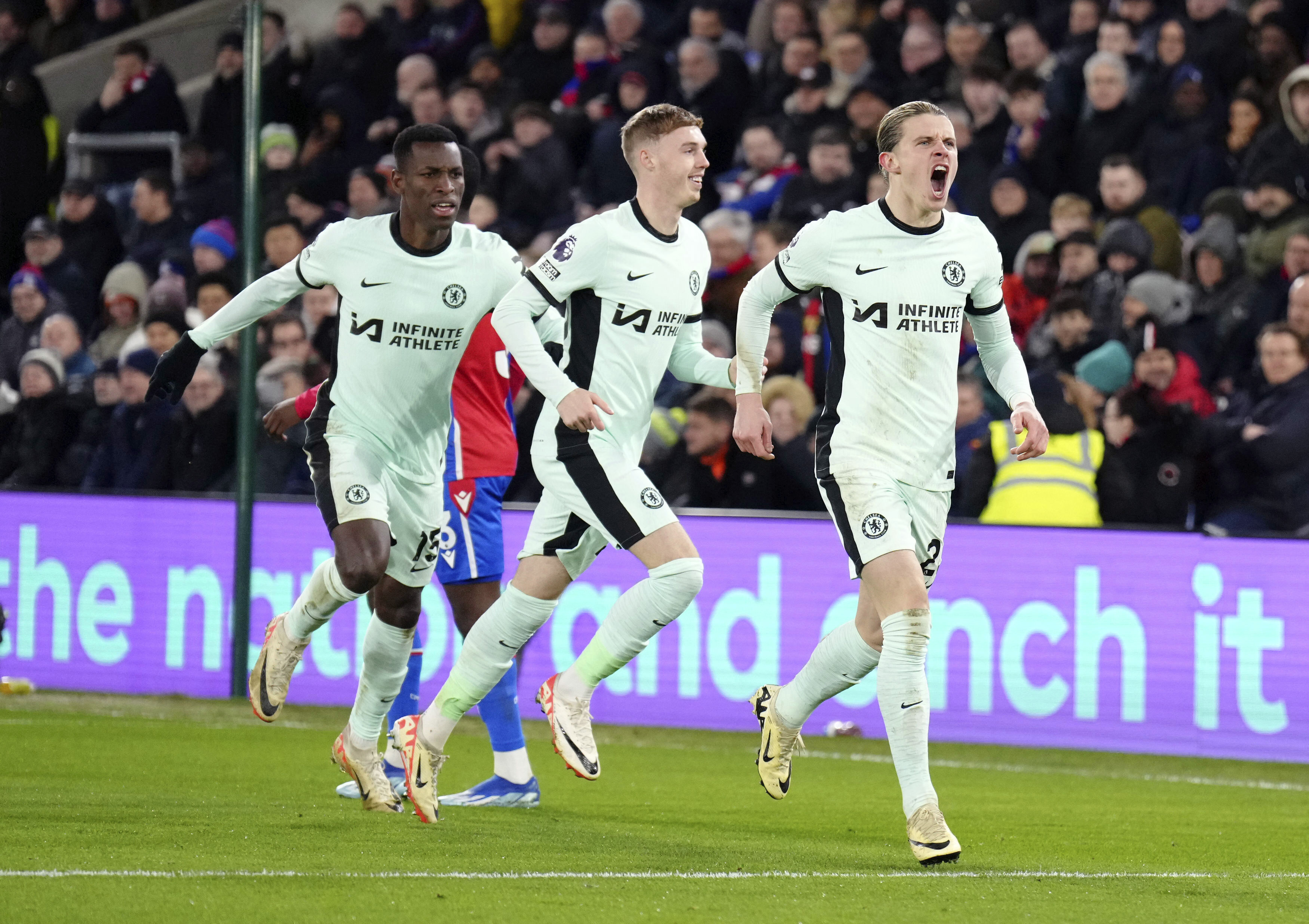 Chelsea's Conor Gallagher celebrates scoring his side's first goal of the game, during the English Premier League soccer match between Crystal Palace and Chelsea, at Selhurst Park,  in London, Monday, Feb. 12, 2024. (John Walton/PA via AP)