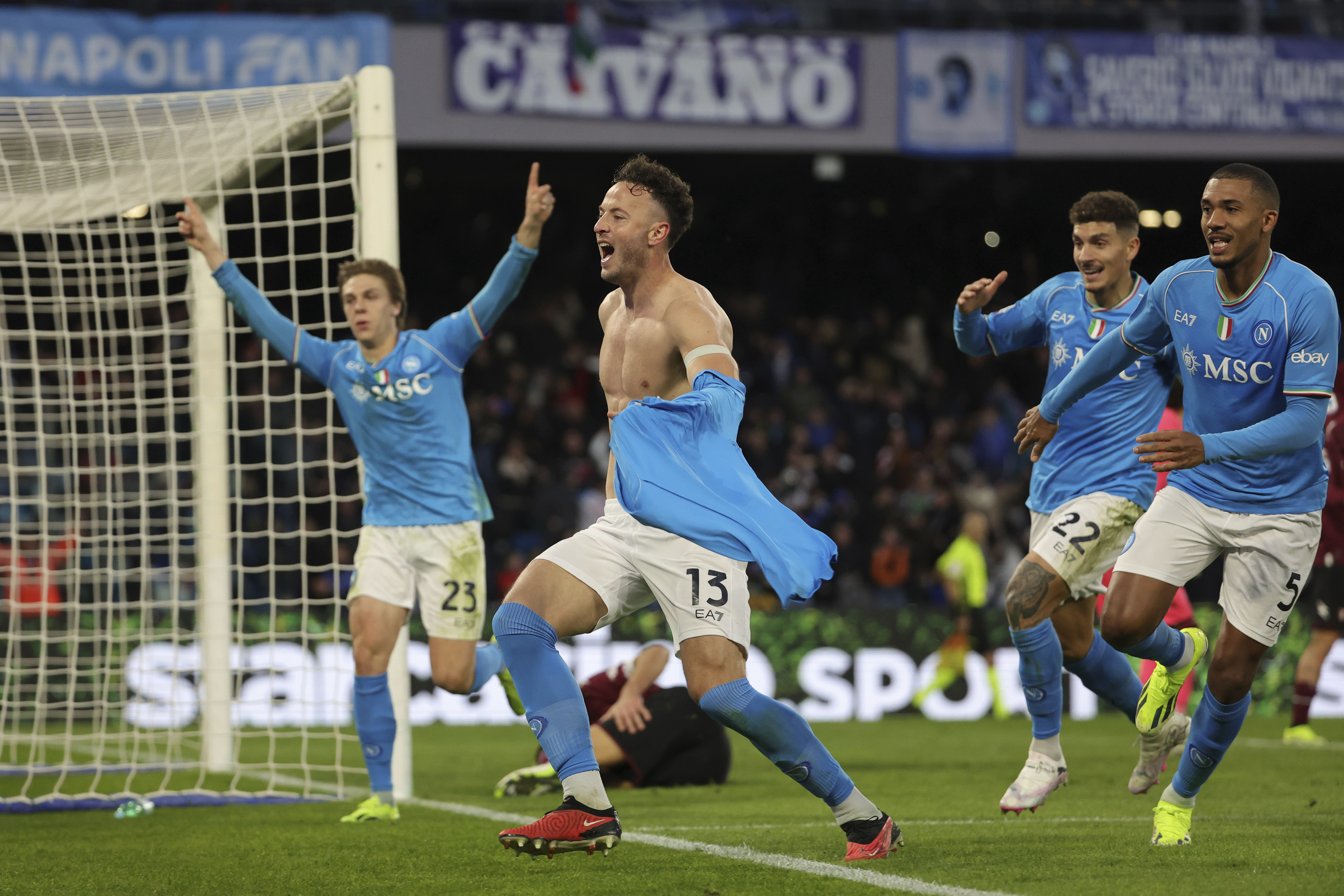 Napoli's Amir Rrahmani celebrates after scoring a goal, during the Italian Serie A soccer match between Napoli and Salernitana, at the Diego Armando Maradona stadium, in Naples, Italy, Saturday, Jan. 13, 2024.  (Alessandro Garofalo/LaPresse via AP)