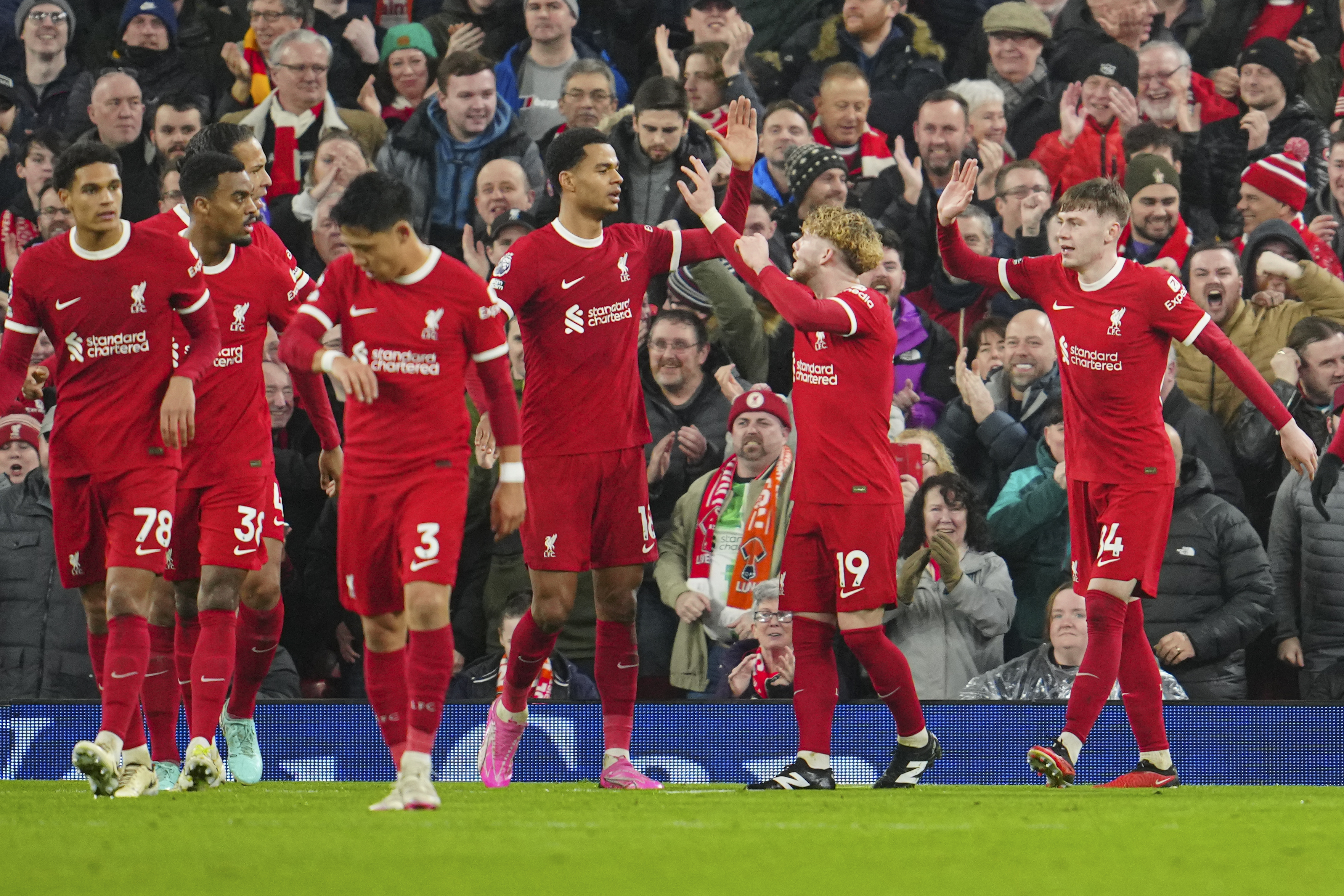 Liverpool's Cody Gakpo celebrates after scoring his side's second goal during the English Premier League soccer match between Liverpool and Luton Town, at Anfield stadium in Liverpool, England, Wednesday, Feb. 21, 2024. (AP Photo/Jon Super)