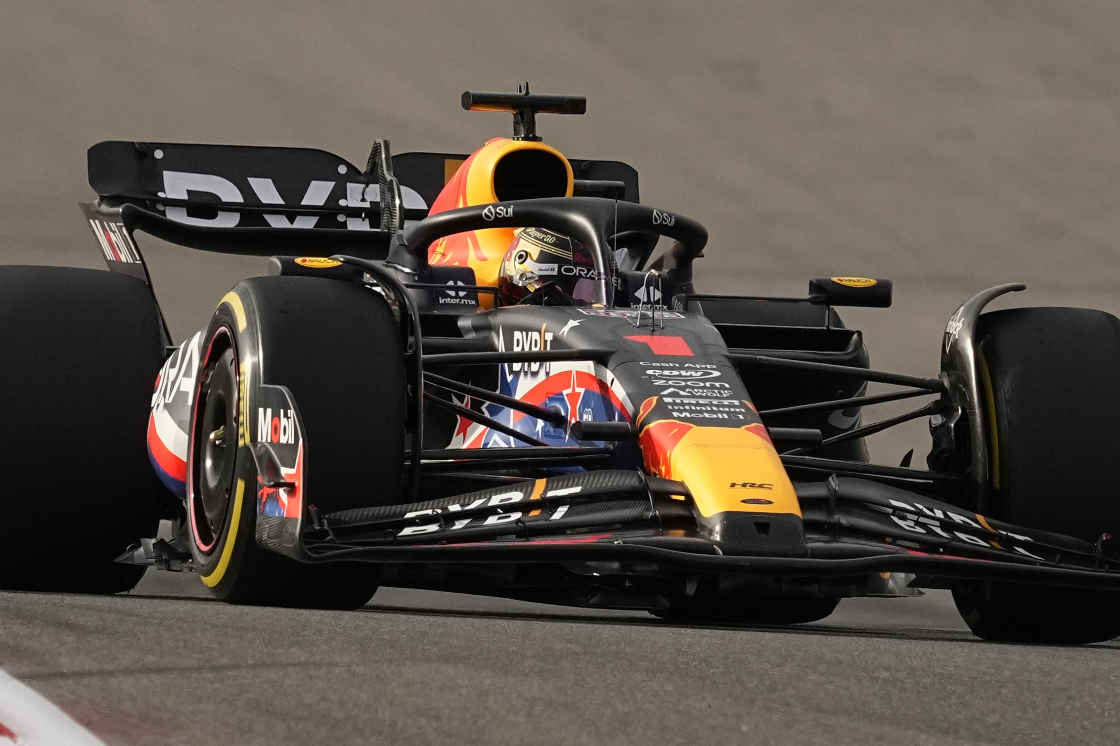 Red Bull driver Max Verstappen, of the Netherlands, steers his car through a turn during the sprint ahead of the Formula One U.S. Grand Prix auto race at Circuit of the Americas, Saturday, Oct. 21, 2023, in Austin, Texas. (AP Photo/Eric Gay)