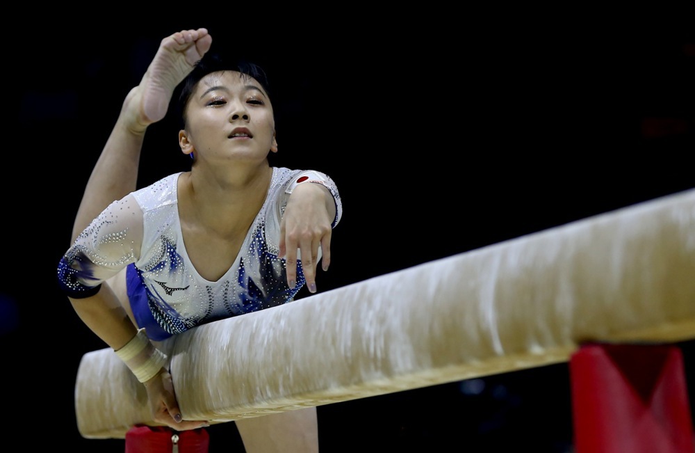 epa10290594 Shoko Miyata of Japan competes in the Balance Beam event of the women's Apparatus Finals at the 51st FIG Artistic Gymnastics World Championships in Liverpool, Britain, 06 November 2022.  EPA-EFE/ADAM VAUGHAN