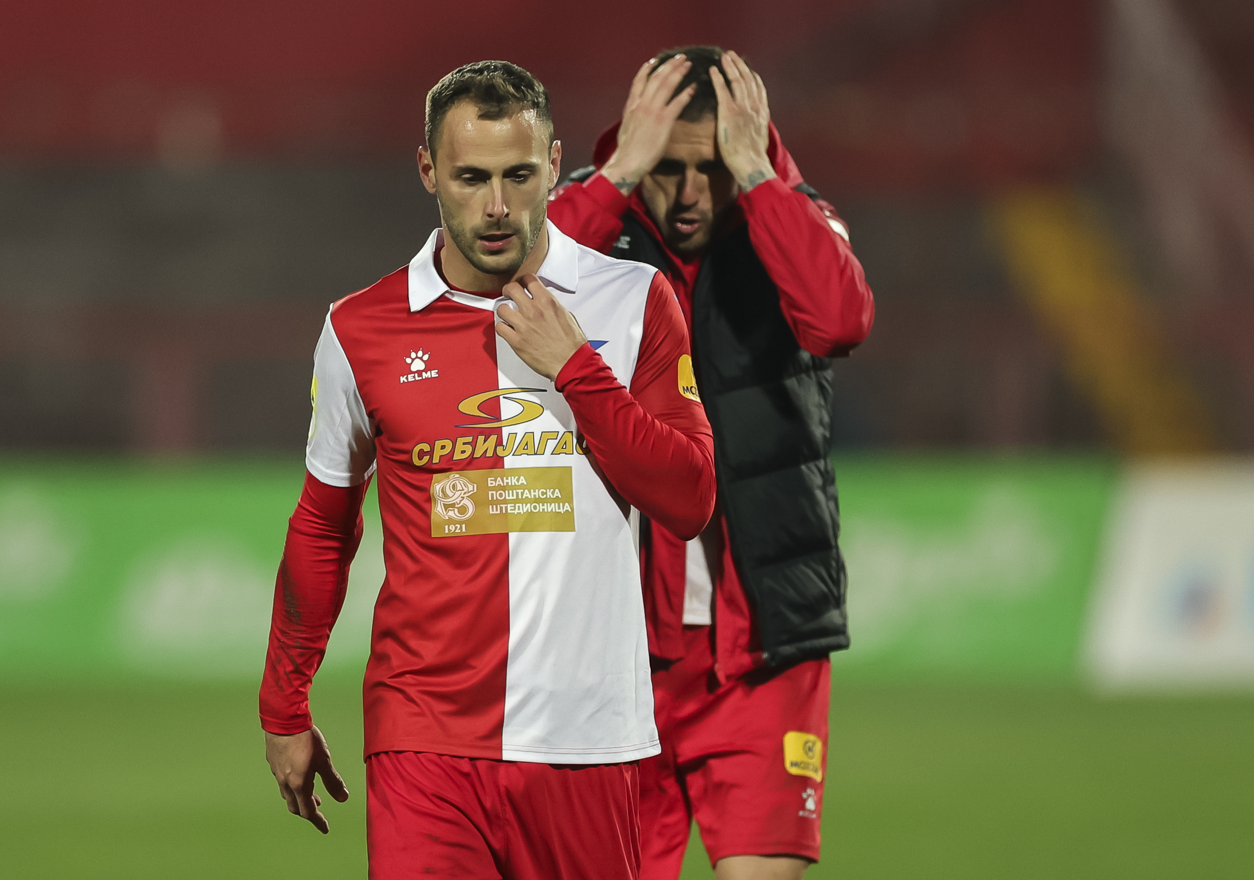 Filip Malbasic (L) and Aleksa Vukanovic look dejected during the Mozzart Super Liga Season 2023/2024 match between Vojvodina and Spartak at stadium Karadjordje on February 25, 2024 in Novi Sad, Serbia. (Photo by Srdjan Stevanovic/Starsport.rs ©)