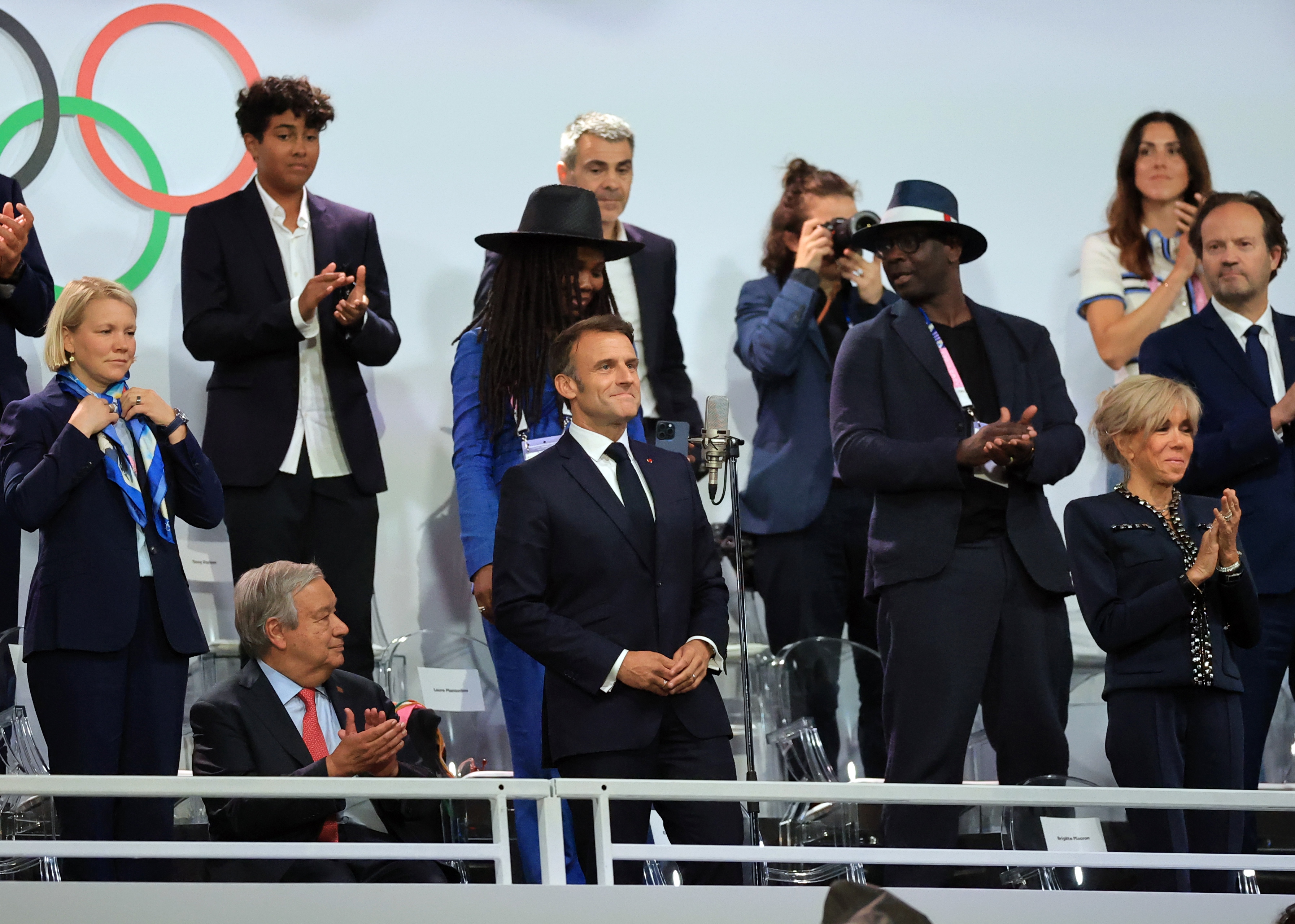 epa11498103 French President Emmanuel Macron (C) declares the Games open at Trocadero during the Opening Ceremony of the Paris 2024 Olympic Games, in Paris, France, 26 July 2024.  EPA-EFE/MARTIN DIVISEK
