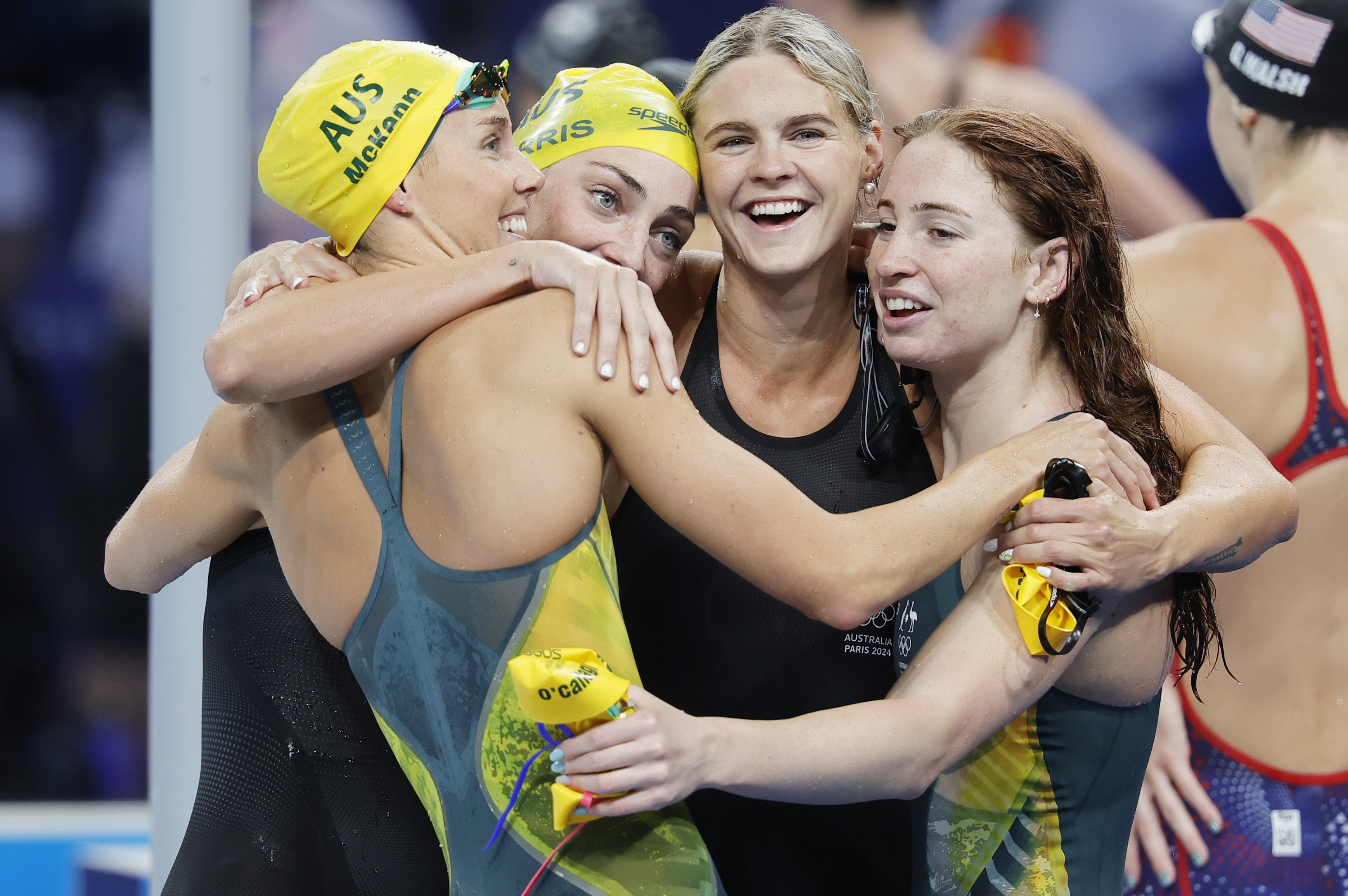 epa11500871 Team Australia celebrates winning the Women 4x100 Freestyle Relay final of the Swimming competitions in the Paris 2024 Olympic Games, at the Paris La Defense Arena in Paris, France, 27 July 2024.  EPA-EFE/RONALD WITTEK