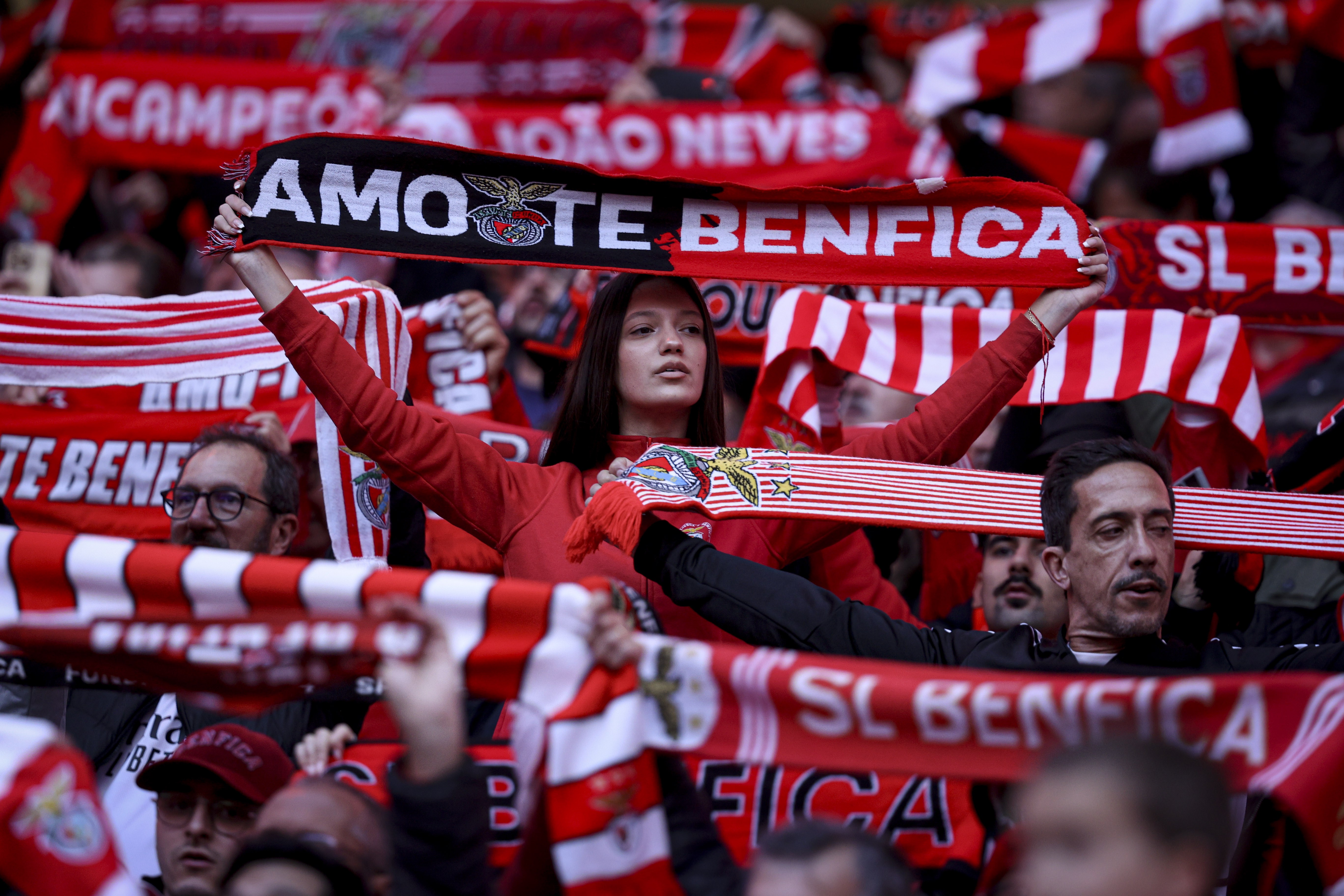 epa11181245 Benfica supporters cheer during the First League Soccer match Benfica vs Portimonense held at Luz Stadium, in Lisbon, Portugal, 25 February 2024.  EPA-EFE/FILIPE AMORIM