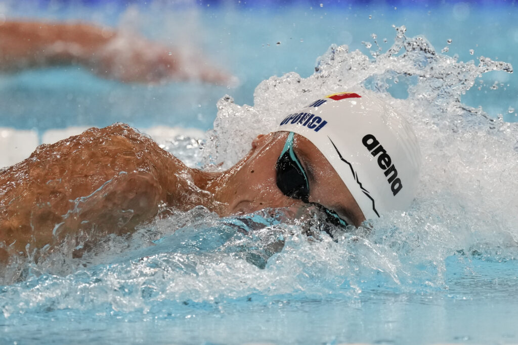 David Popovici, of Romania, competes in the men's 200-meter freestyle final at the 2024 Summer Olympics, Monday, July 29, 2024, in Nanterre, France. (AP Photo/Martin Meissner)