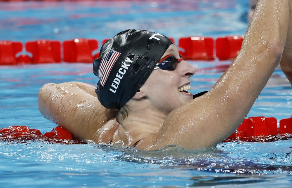 epa11523545 Katie Ledecky of USA celebrates winning the Women 800m Freestyle final of the Swimming competitions in the Paris 2024 Olympic Games, at the Paris La Defense Arena in Paris, France, 03 August 2024.  EPA-EFE/RITCHIE B. TONGO