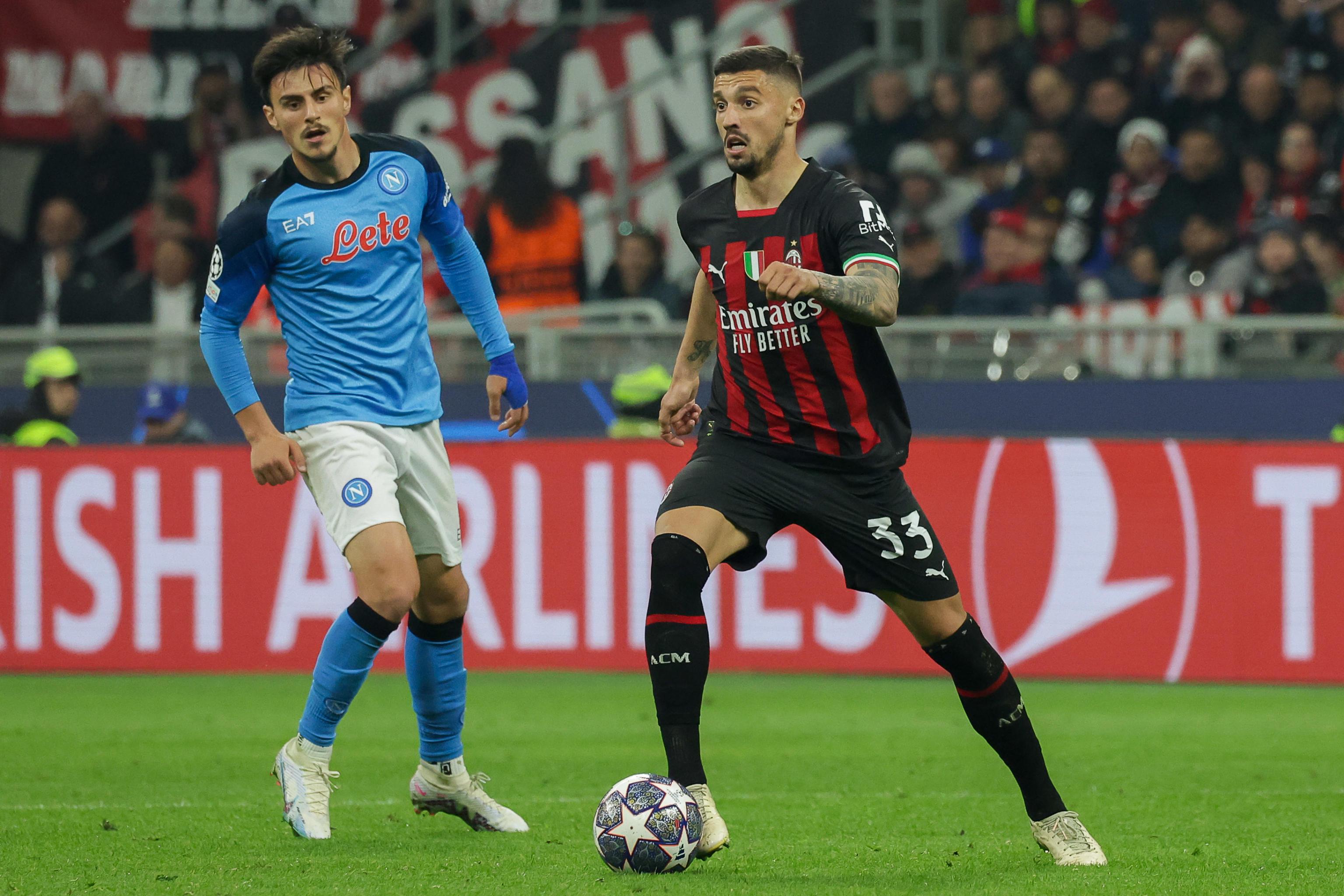 epa10570216 AC Milan's midfielder Rade Krunic (R) in action during the UEFA Champions League quarter-final first leg match between AC Milan and SSC Napoli at Giuseppe Meazza Stadium in Milan, Italy, 12 April 2023.  EPA-EFE/Roberto Bregani