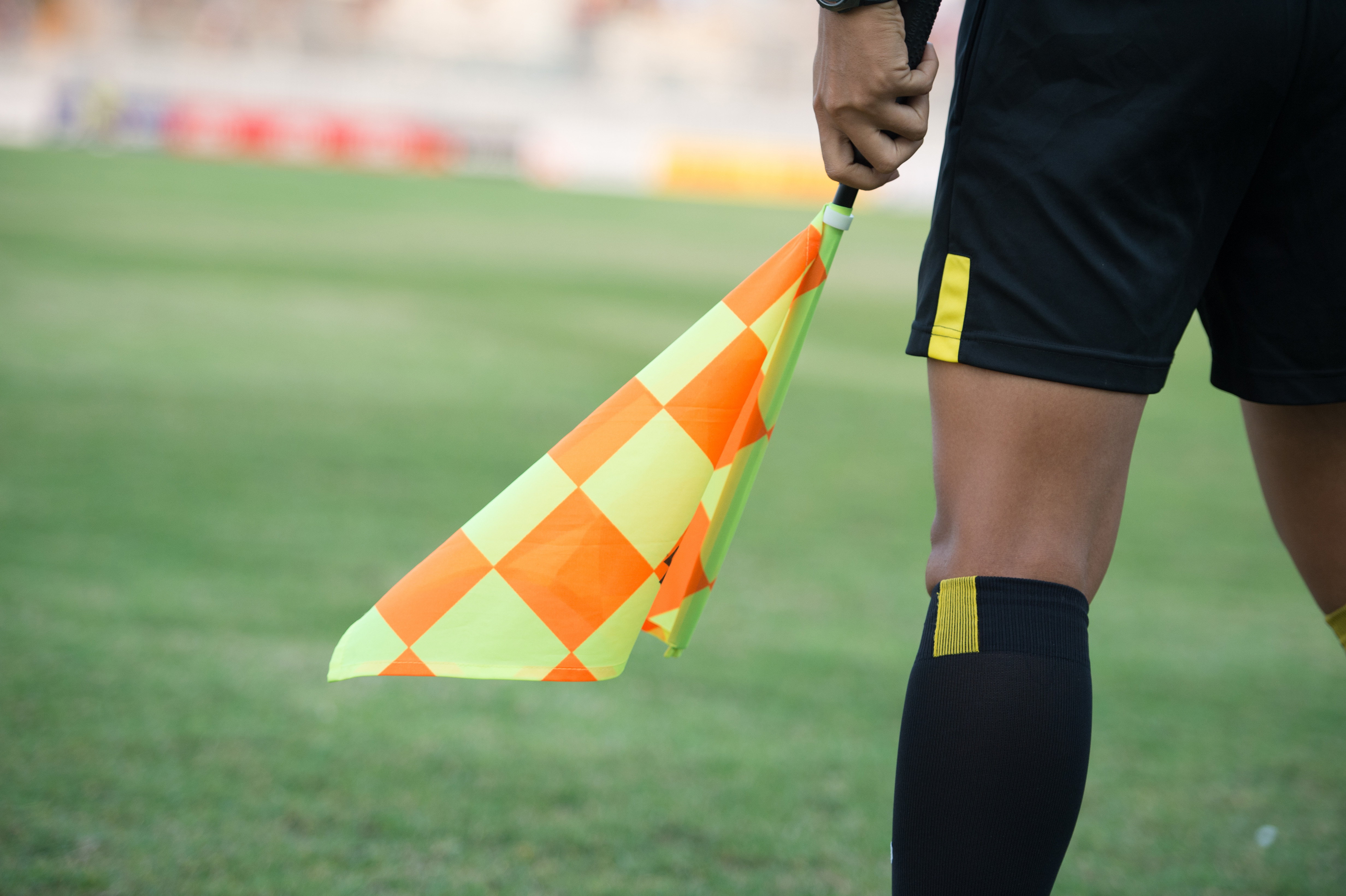 Assistant,Football,Referee,And,Referee's,Flag