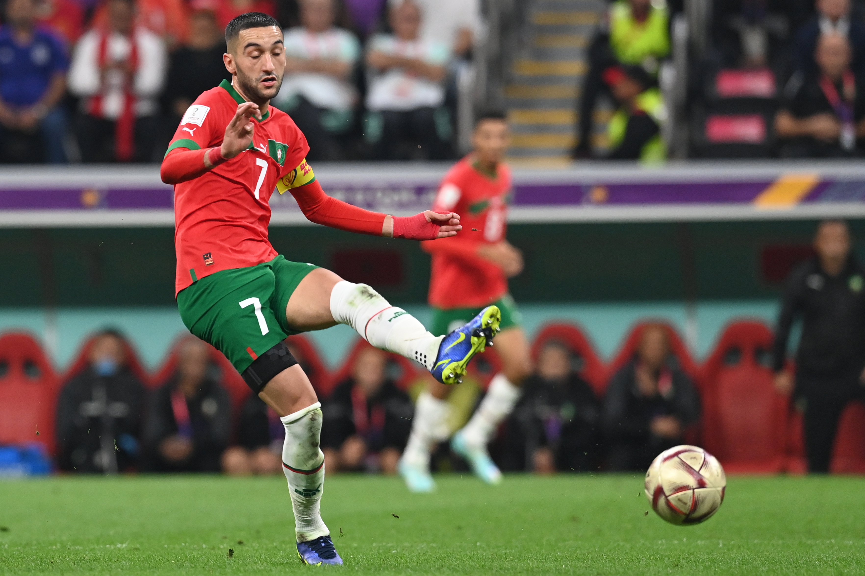 epa10365955 Hakim Ziyech of Morocco in action during the FIFA World Cup 2022 semi final between France and Morocco at Al Bayt Stadium in Al Khor, Qatar, 14 December 2022.  EPA-EFE/Georgi Licovski