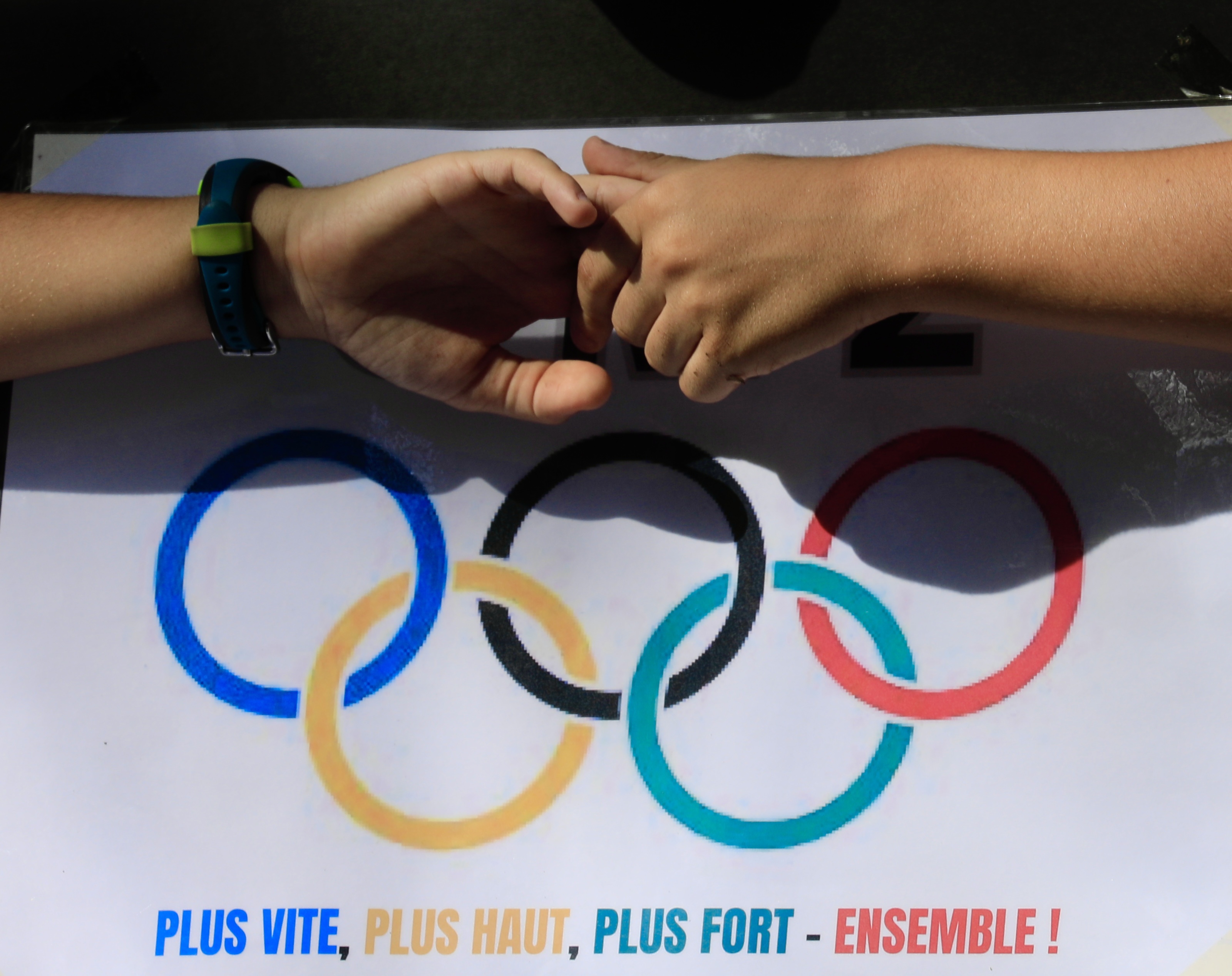 Students participate in event to drum up the Paris 2024 Olympics in the Philippines