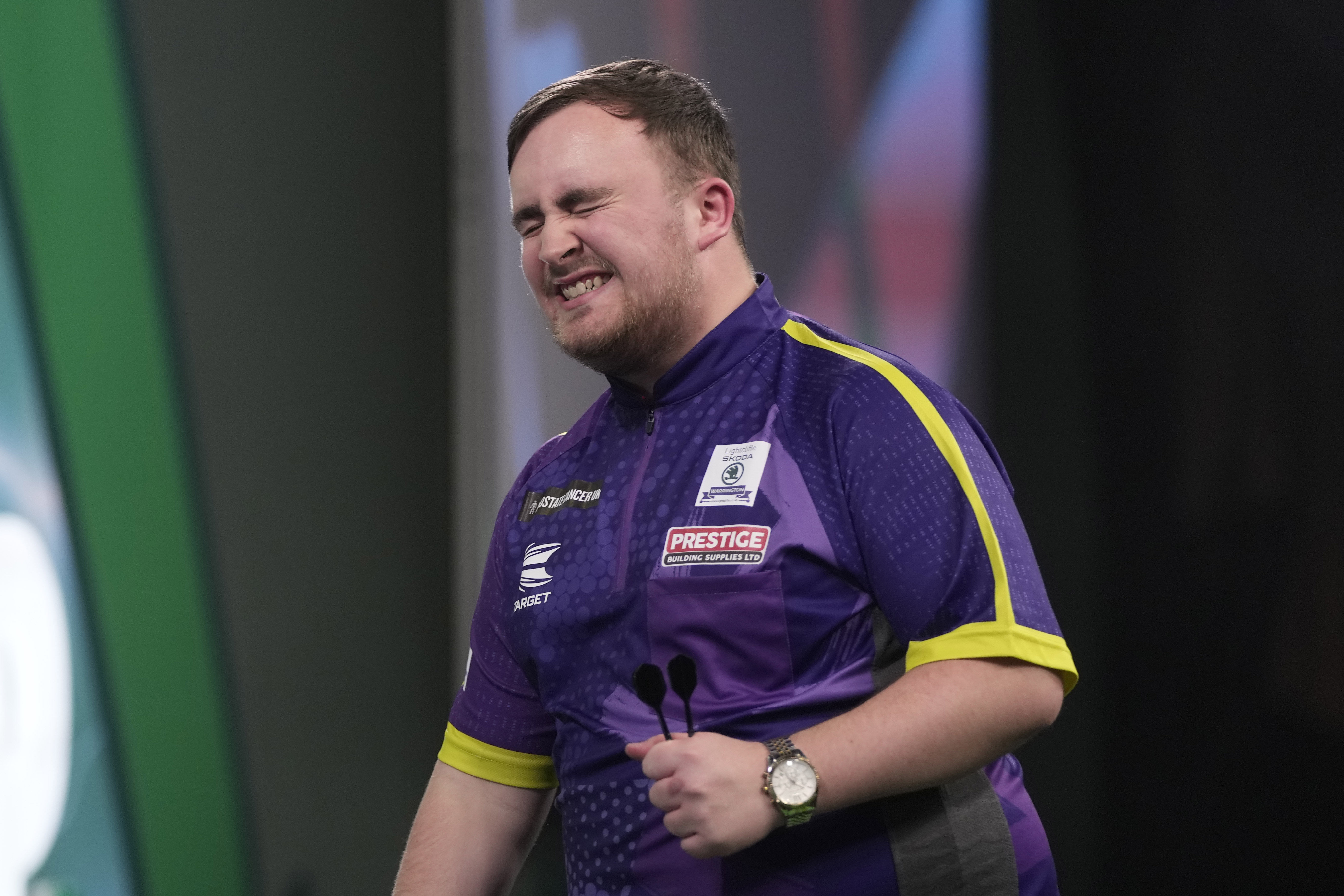 Luke Littler of England during the semifinal match against Scott Williams of England at the World Darts Championship, in London, Tuesday, Jan. 2, 2024. (AP Photo/Kin Cheung)