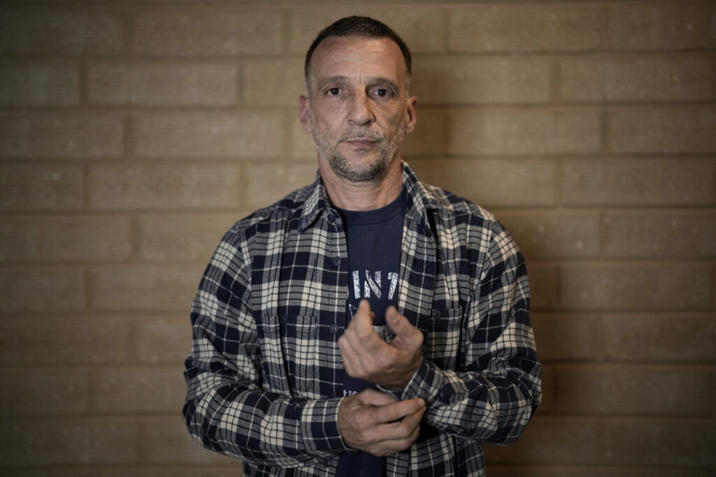 Mathieu Kassovitz poses after an interview with Associated Press, in Tremblay-en-France, Tuesday, Sept. 17, 2024. (AP Photo/Christophe Ena)